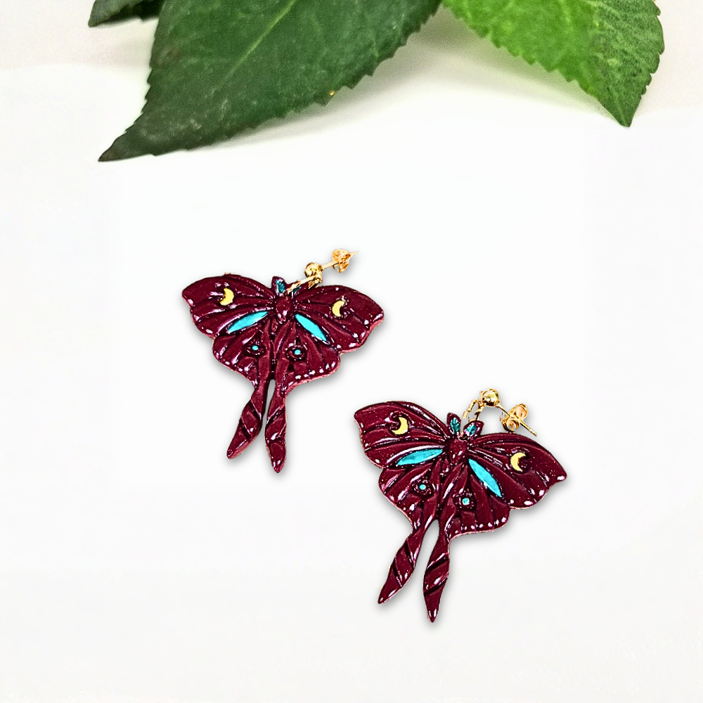 Luna+Moth+Earrings+in+Maroon.png