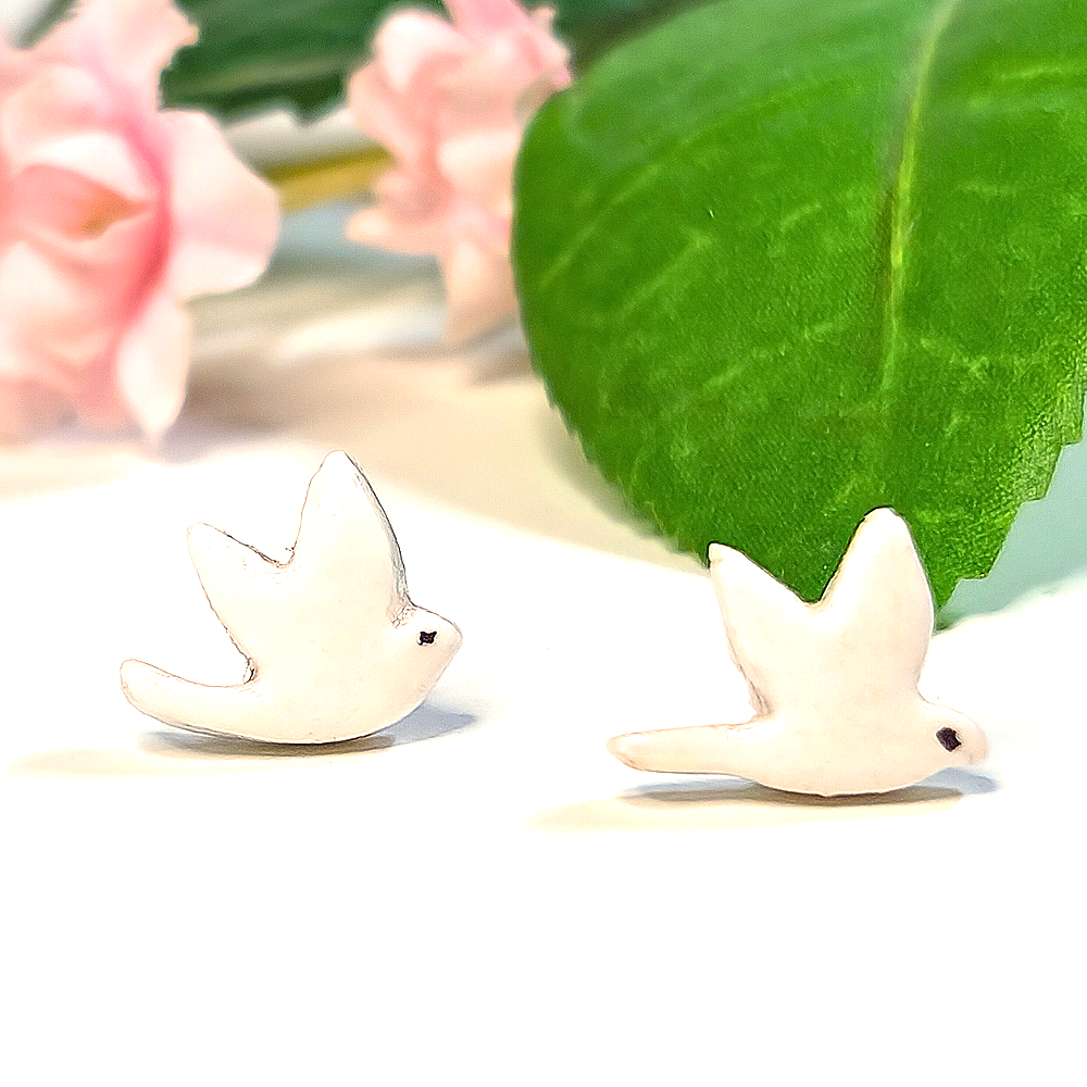 Mini+White+Bird+studs.png