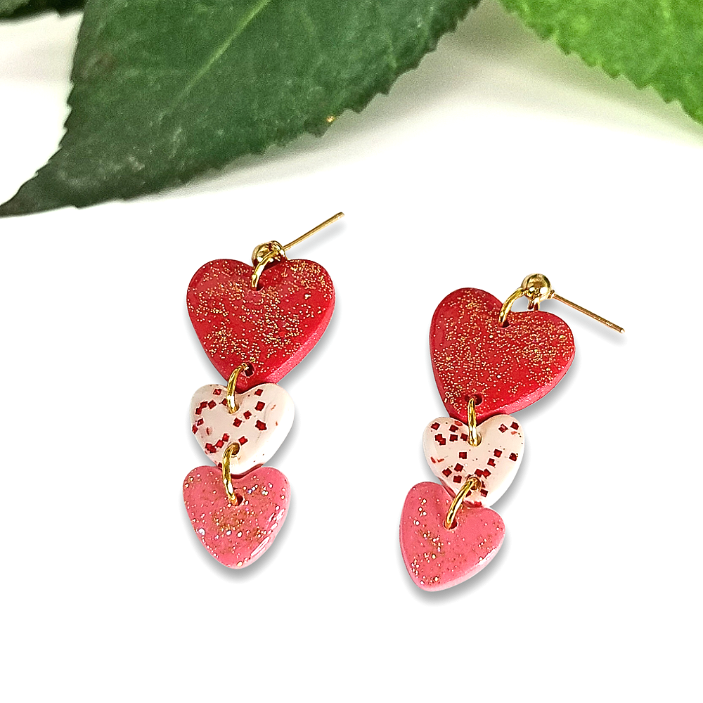 Triple+Heart+Dangles+red+white+pink+with+glitter.png