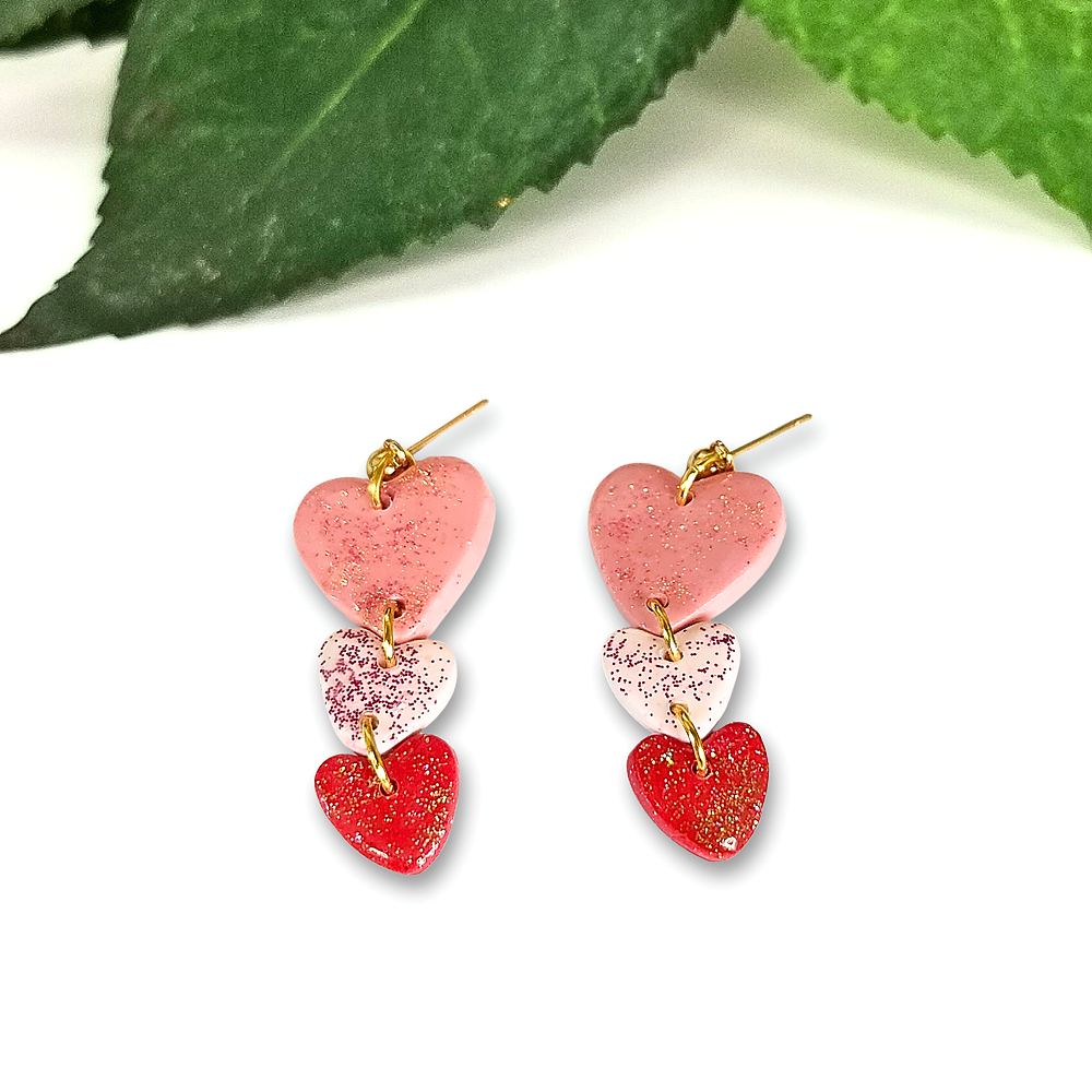 Triple+Heart+Dangles+pink+white+red+with+glitter.png