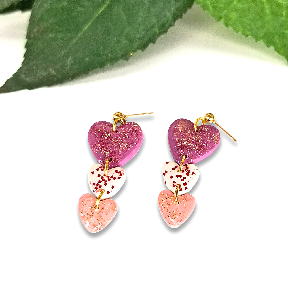 Triple+Heart+Dangles+pink+and+white+with+glitter.png
