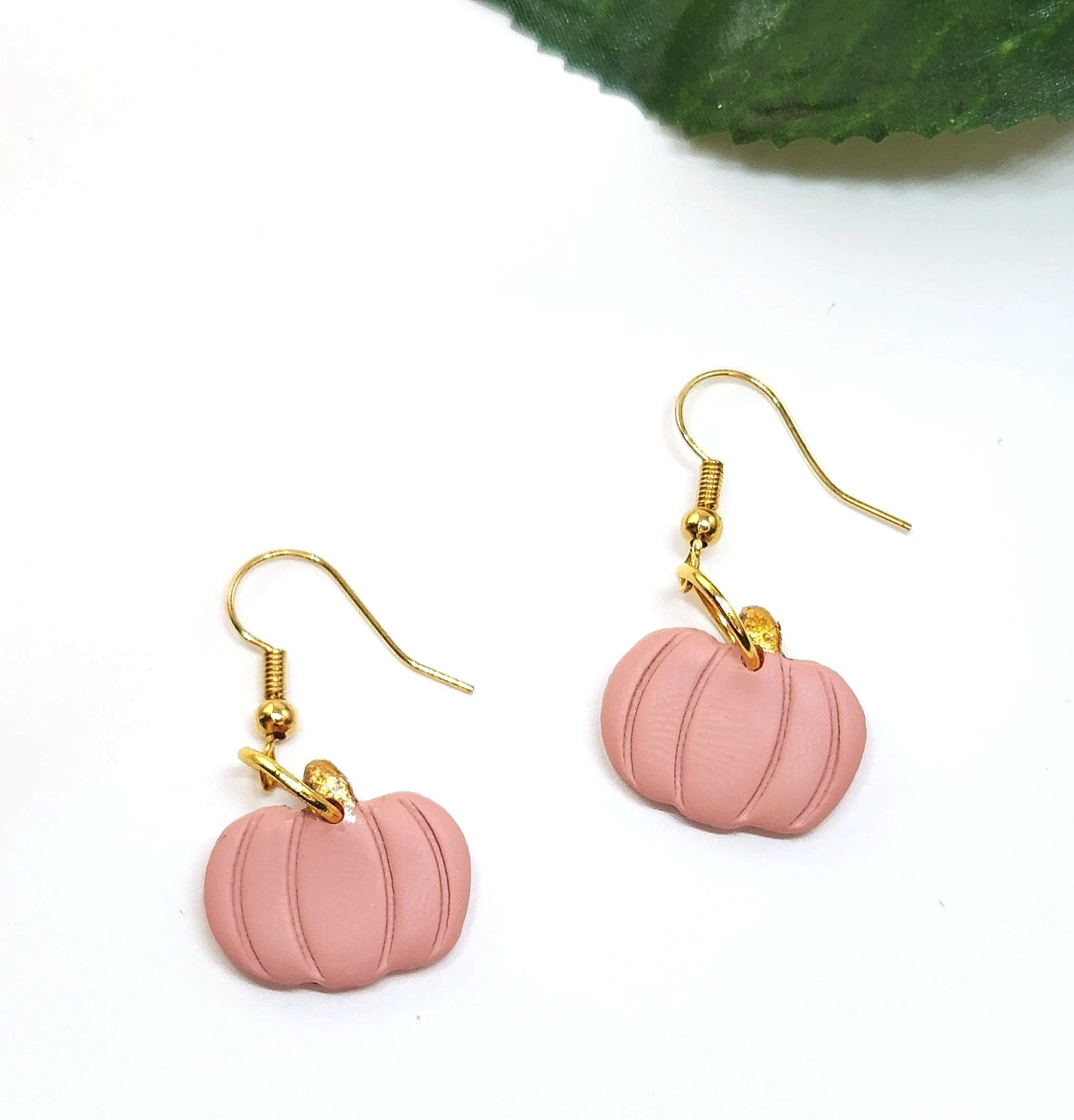 blush pink pumpkin earrings with gold stem