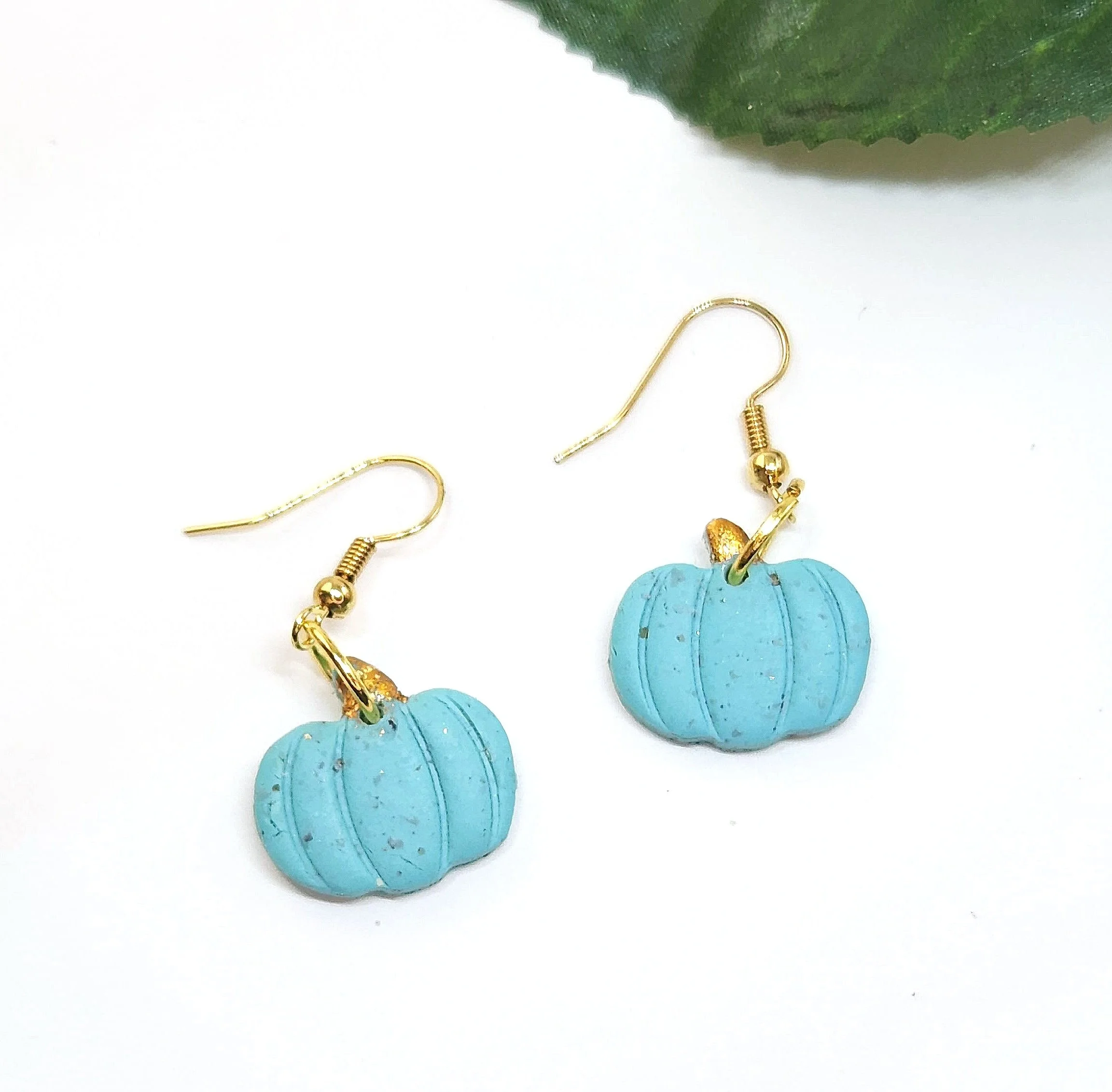 turquoise blue pumpkin dangle earrings with gold stem