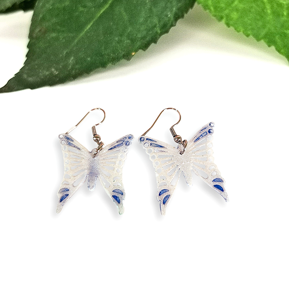 Lacey+White+Butterfly+Earrings.png