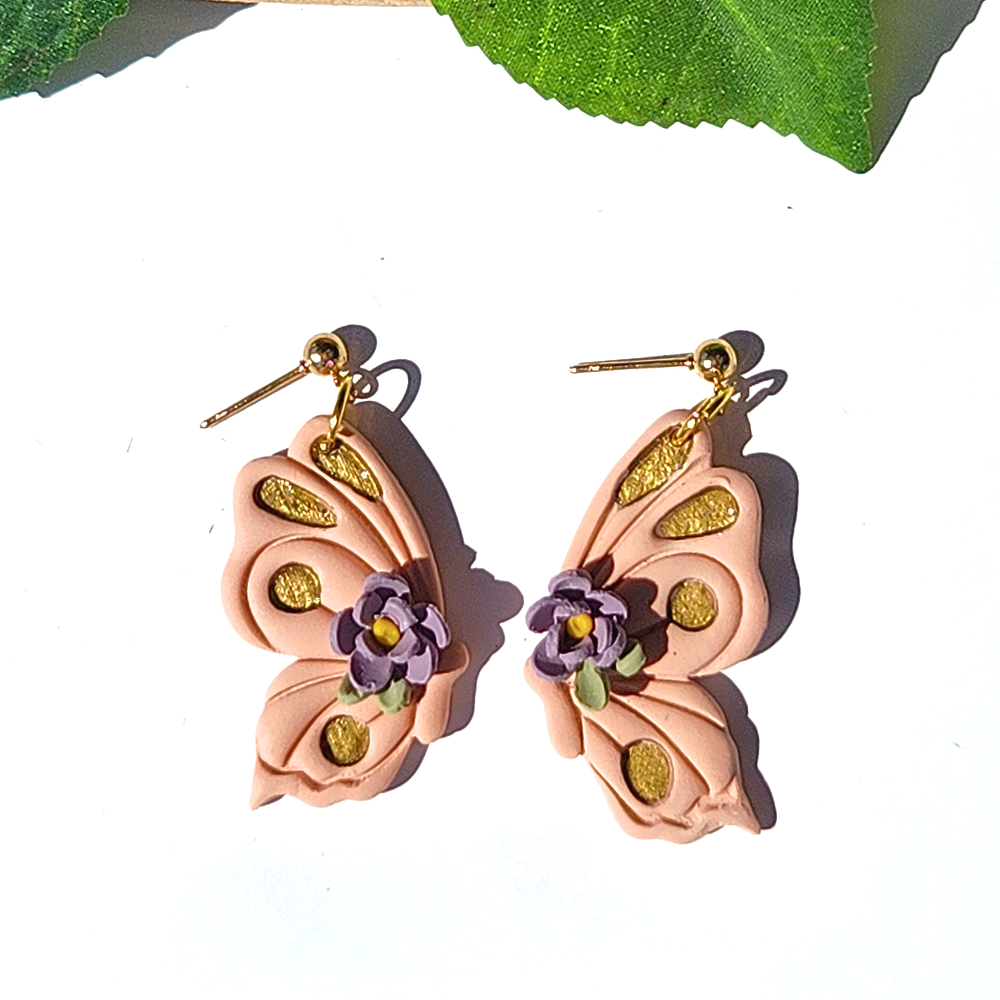 Pink+floral+half+butterfly+earrings.png