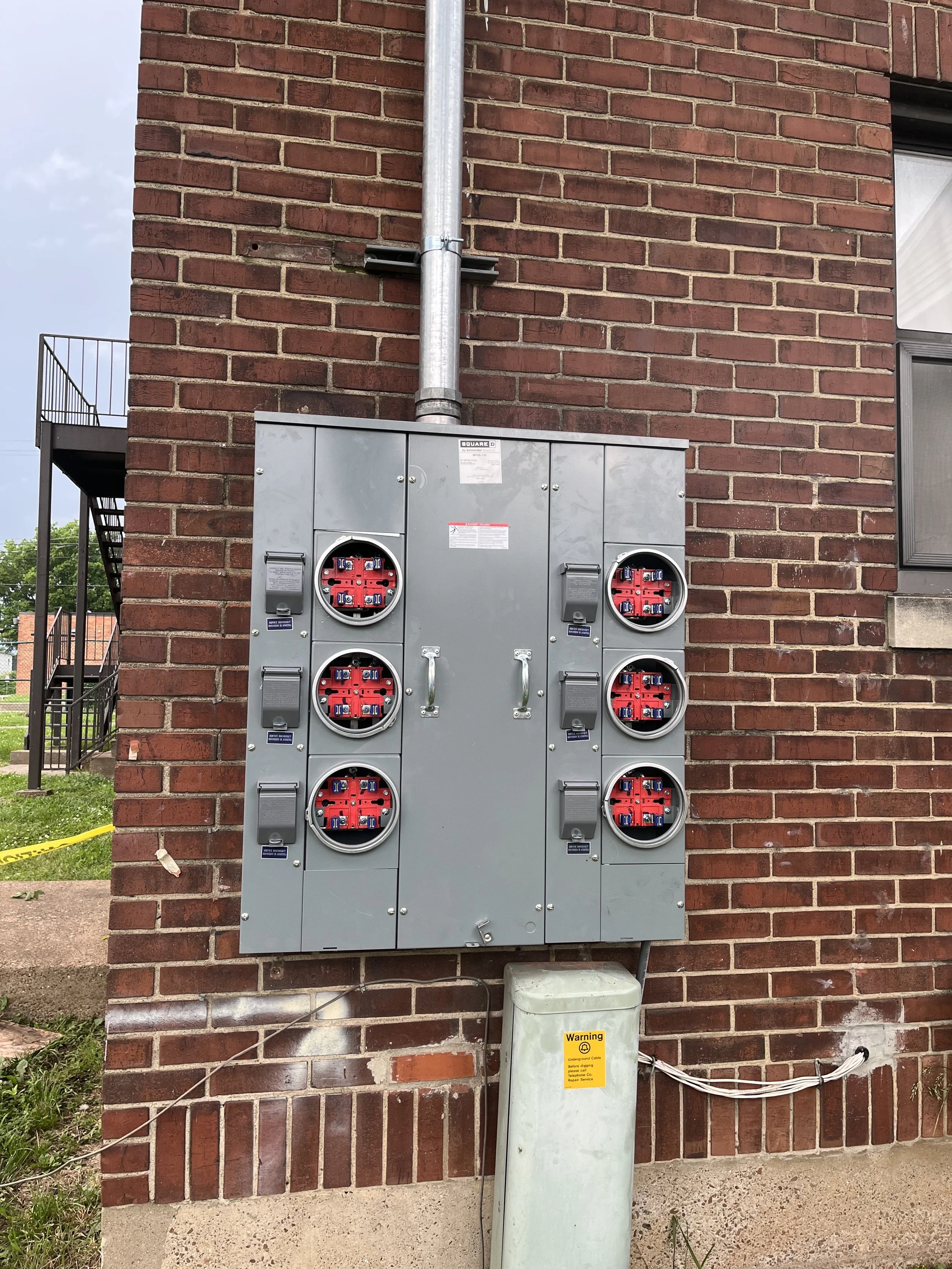 6 gang, 600Amp meter-base replacement after storm damaged tree fell on power line severely damaging the existing meter-base.