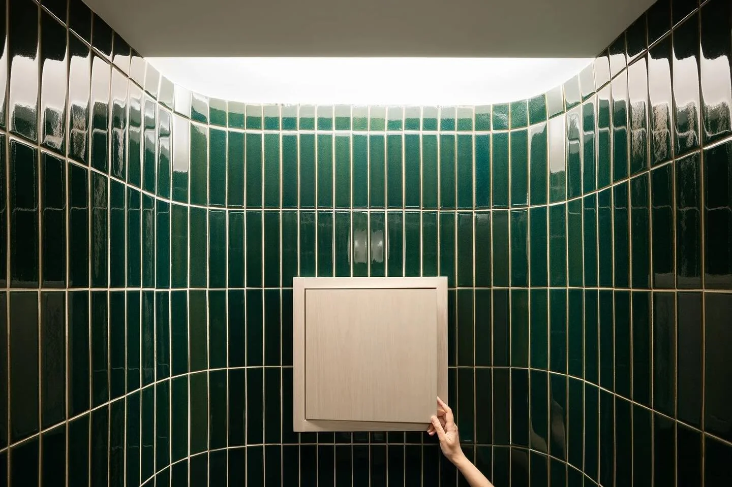 Another view of the sleek green tiles in the powder room on the Dumbo Combo project.  @heathceramics @tilemakestheroom  Photo @devonbanksphoto