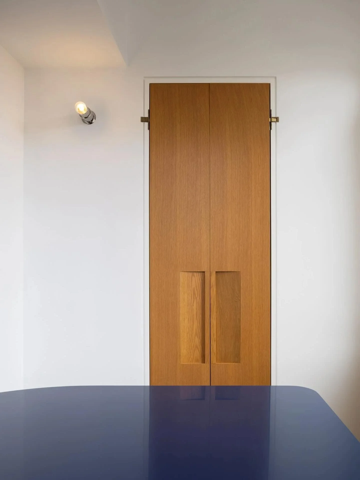 A detail from the eating nook at our recent UWS kitchen renovation.  Even doors to a storage room can be 🔥. Photo by @devonbanksphoto