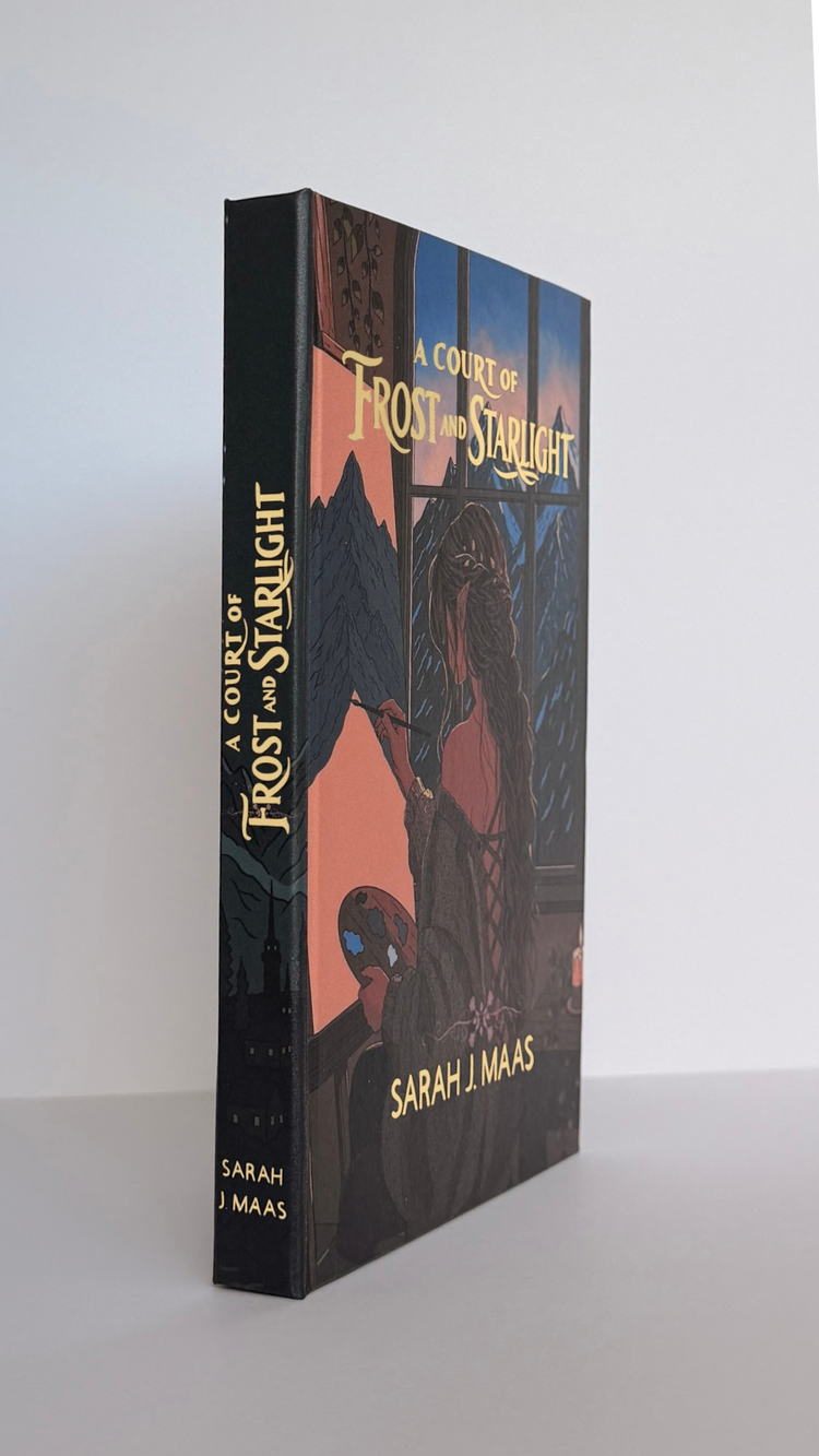 Spine and front cover together, the foiled title running down the spine.