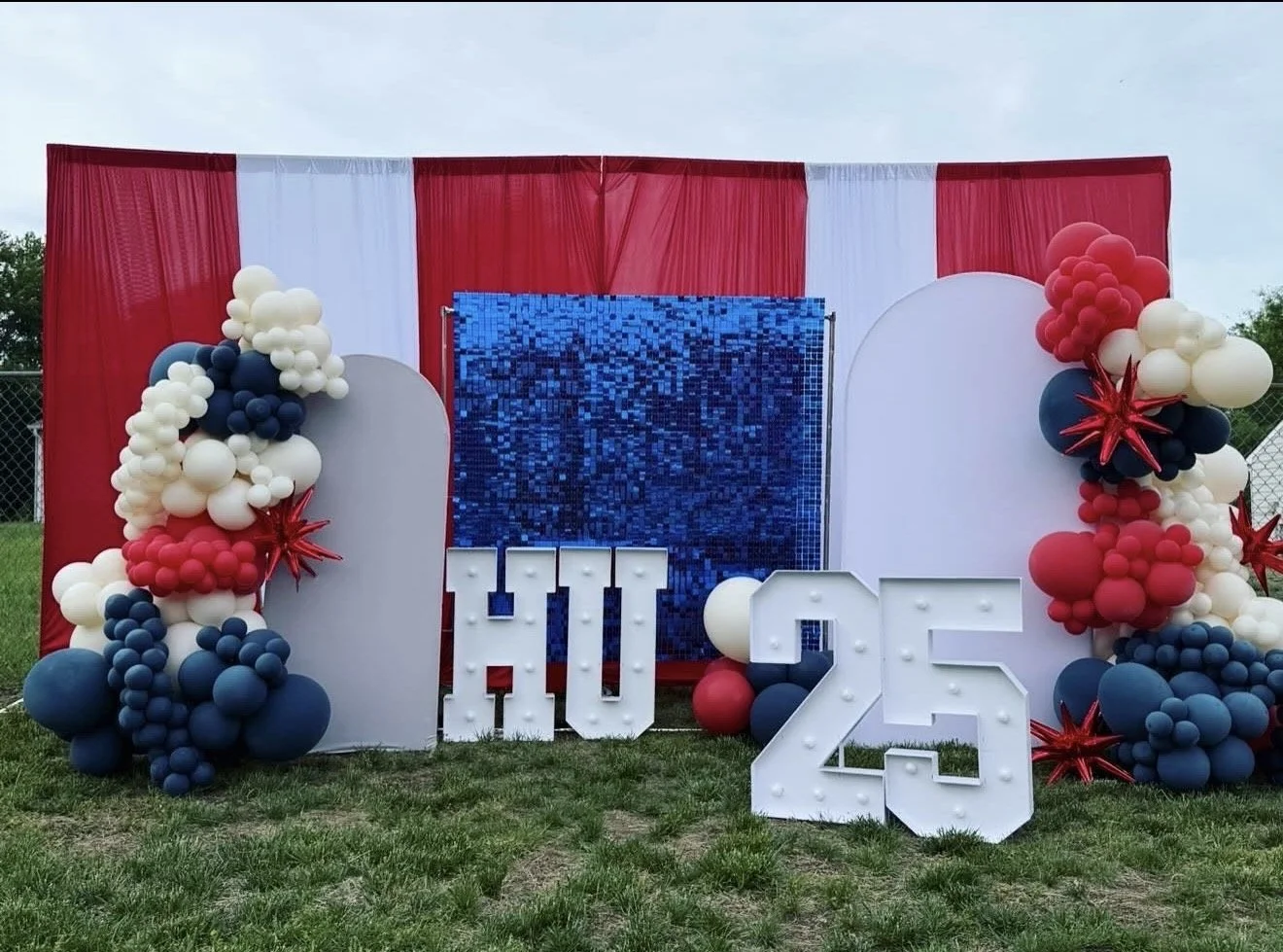 Custom outdoor installation by The Design Ward for a college graduation party