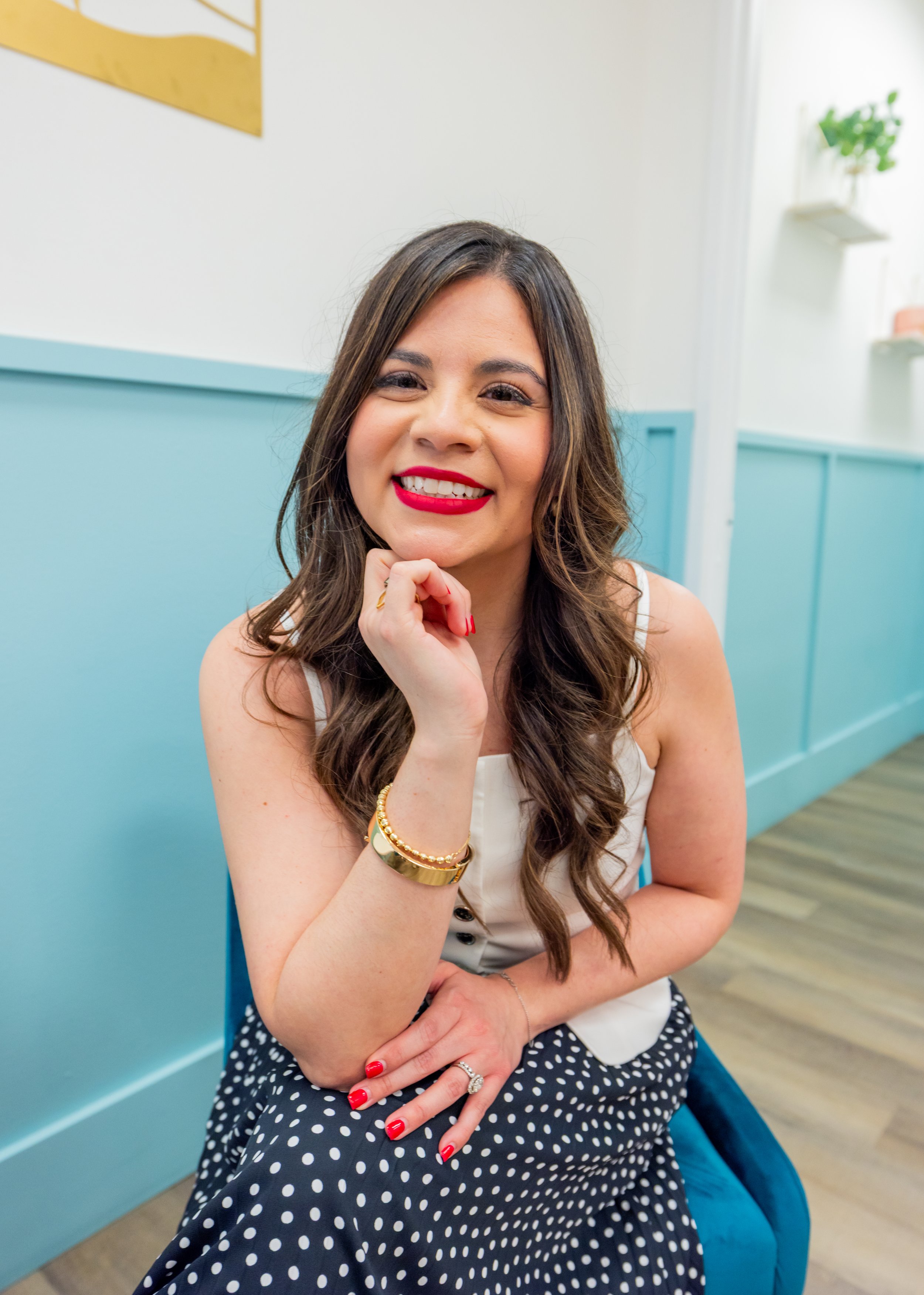 Luana, personal branding strategist and founder of Thread Studio, smiling at the camera in San Antonio, Texas.