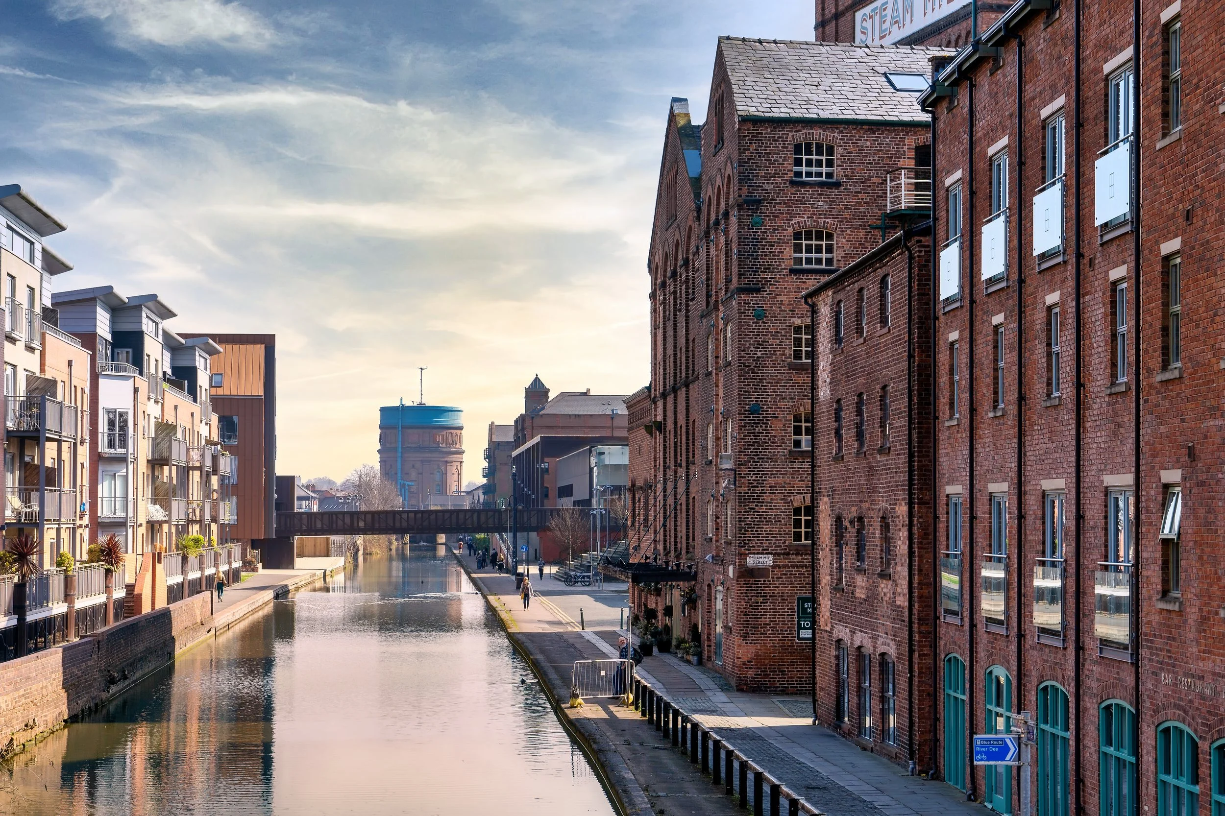 Chester 2022. Shrops Union Canal, the old warehouses contrast against the new apartments, a feature of city's now.