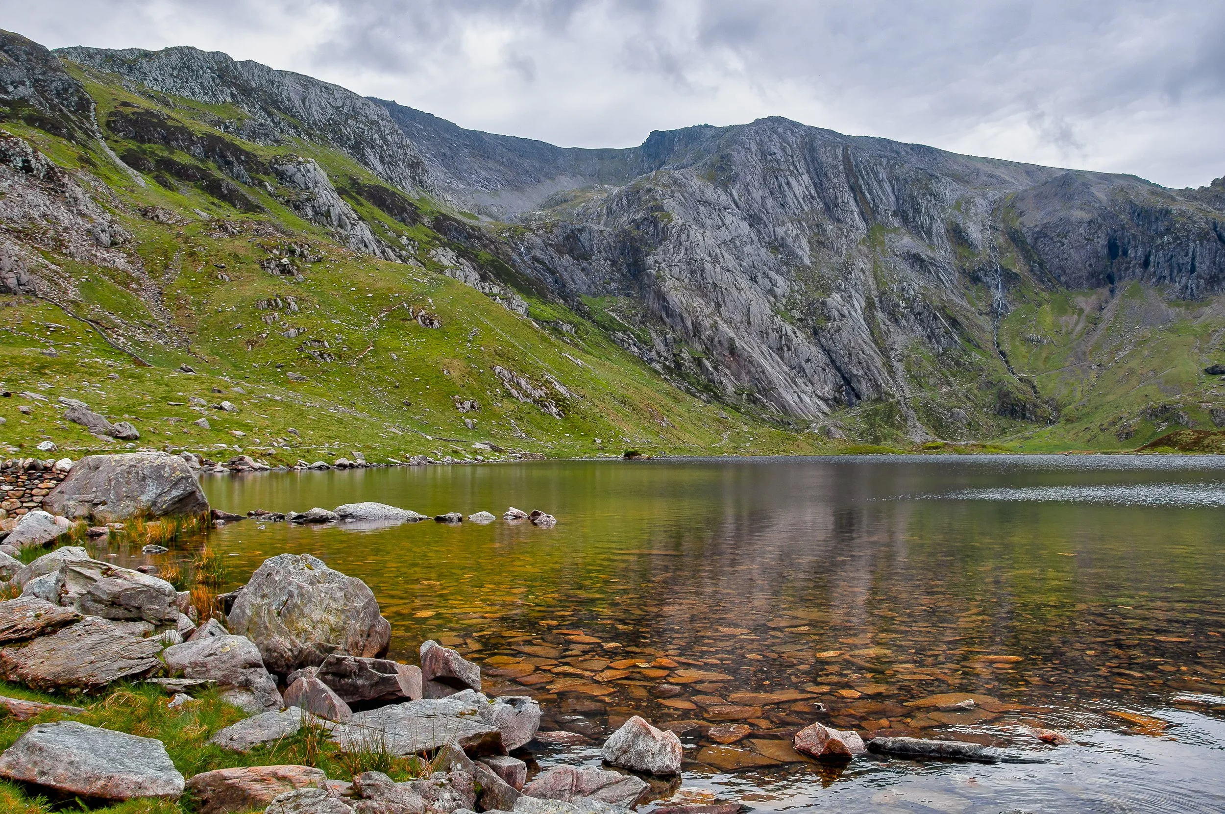17 NW. Llyn Idwal. The pristine clear waters of a glacial lake.