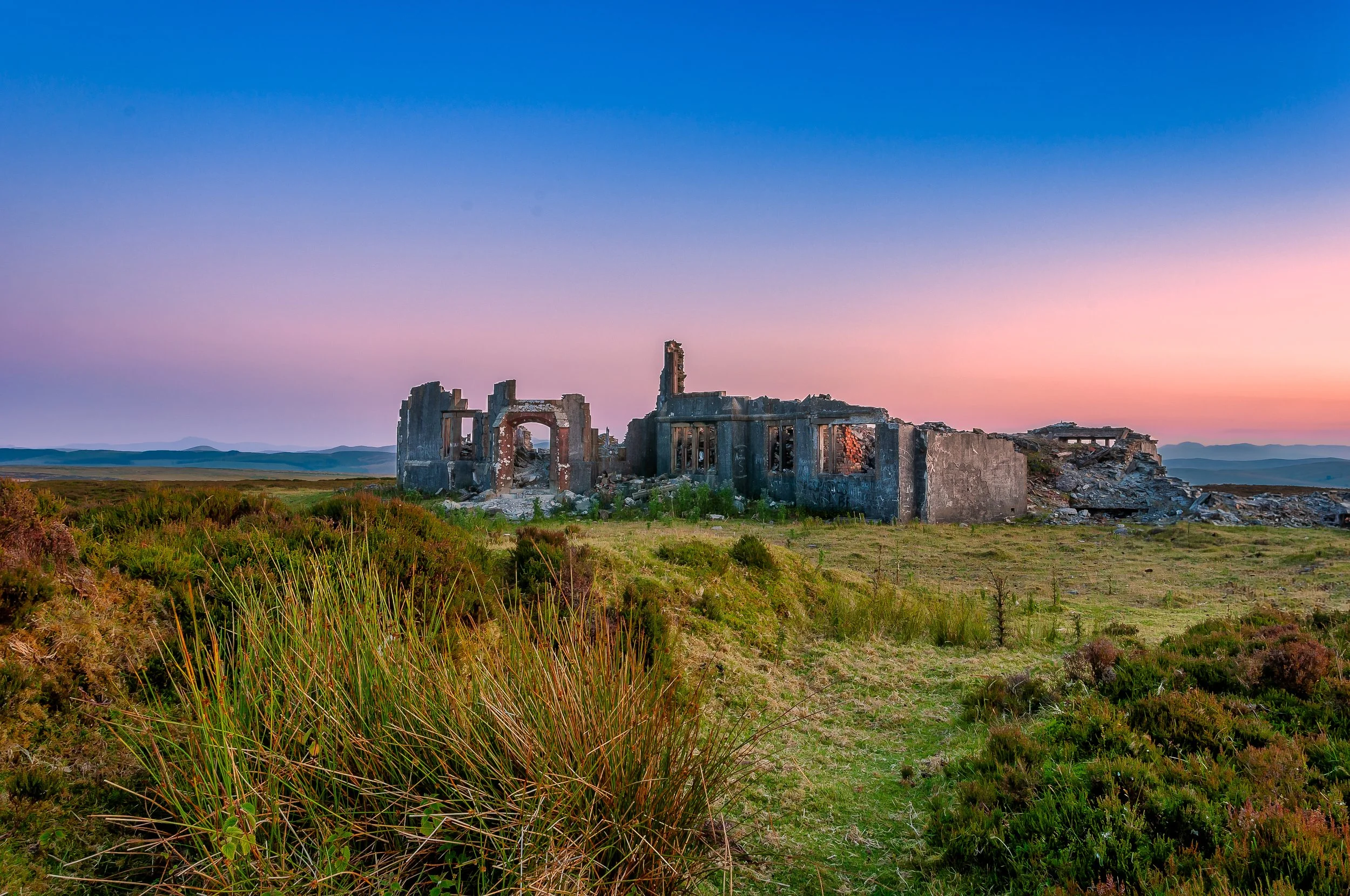 7 NW. Hirathog Ruins. To get there, park at the Sportsmans Arms on the Denbigh Moors and follow the path at the left of the pub.