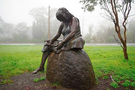 Sculpture of a greiving mother.png