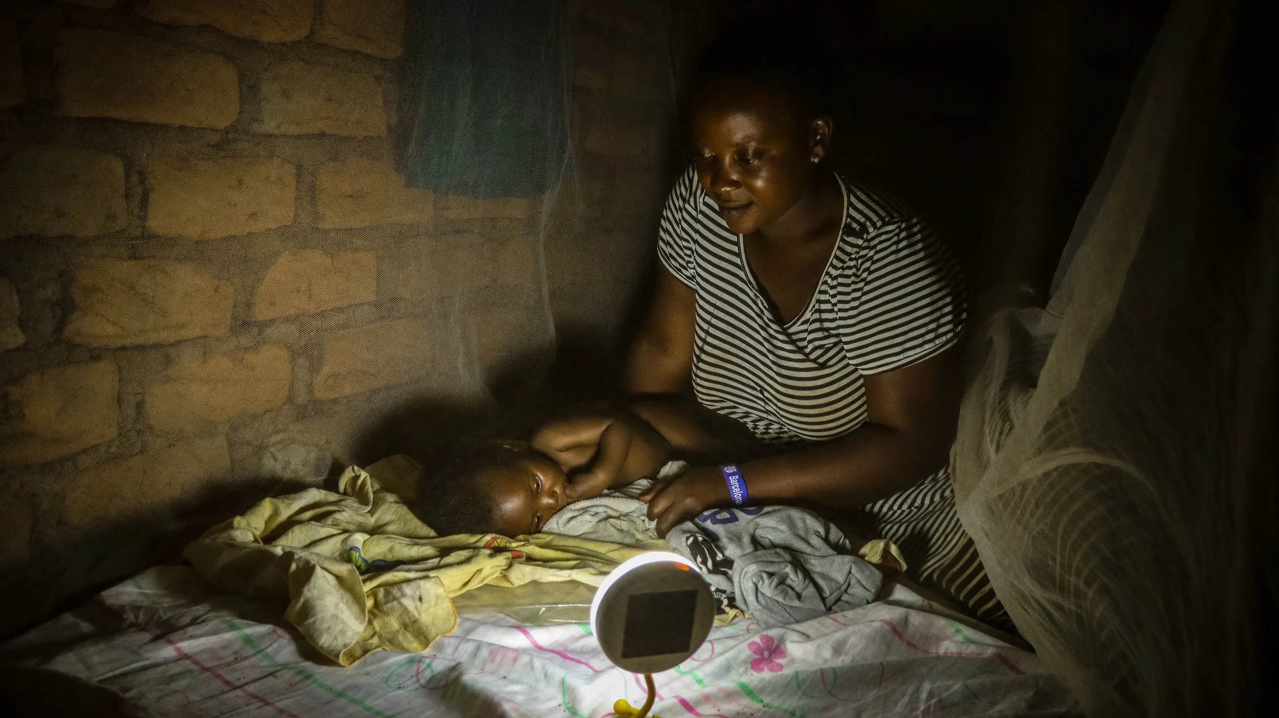 Copy of Rose Mary 32 years with her baby.jpg