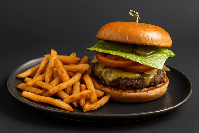 burger with melted cheddar, tomato, romaine, pickle chips and house sauce