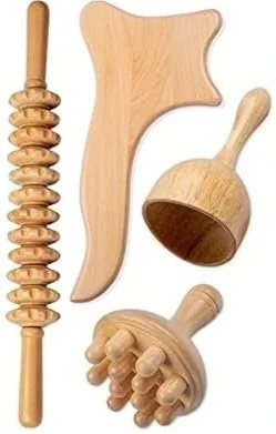 Collection of wooden massage tools including a roller, a flat spatula, a mallet, and a hand roller.
