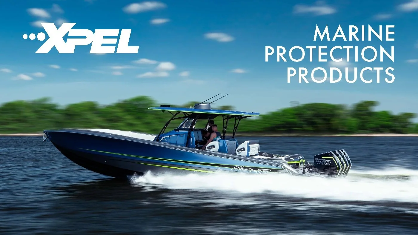 Center console boat protected with XPEL marine protection film showcasing enhanced gloss and surface durability on the water