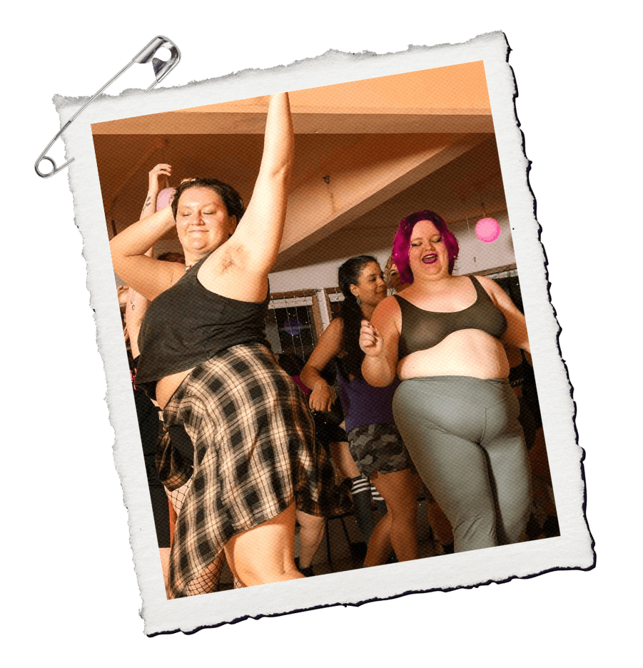Dancers having fun and working up a sweat in dance class
