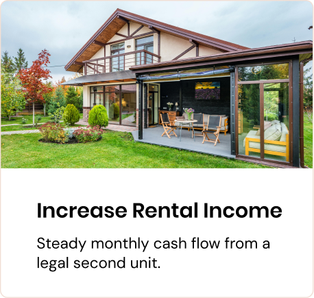 Glass-walled ADU addition attached to a residential home for rental income