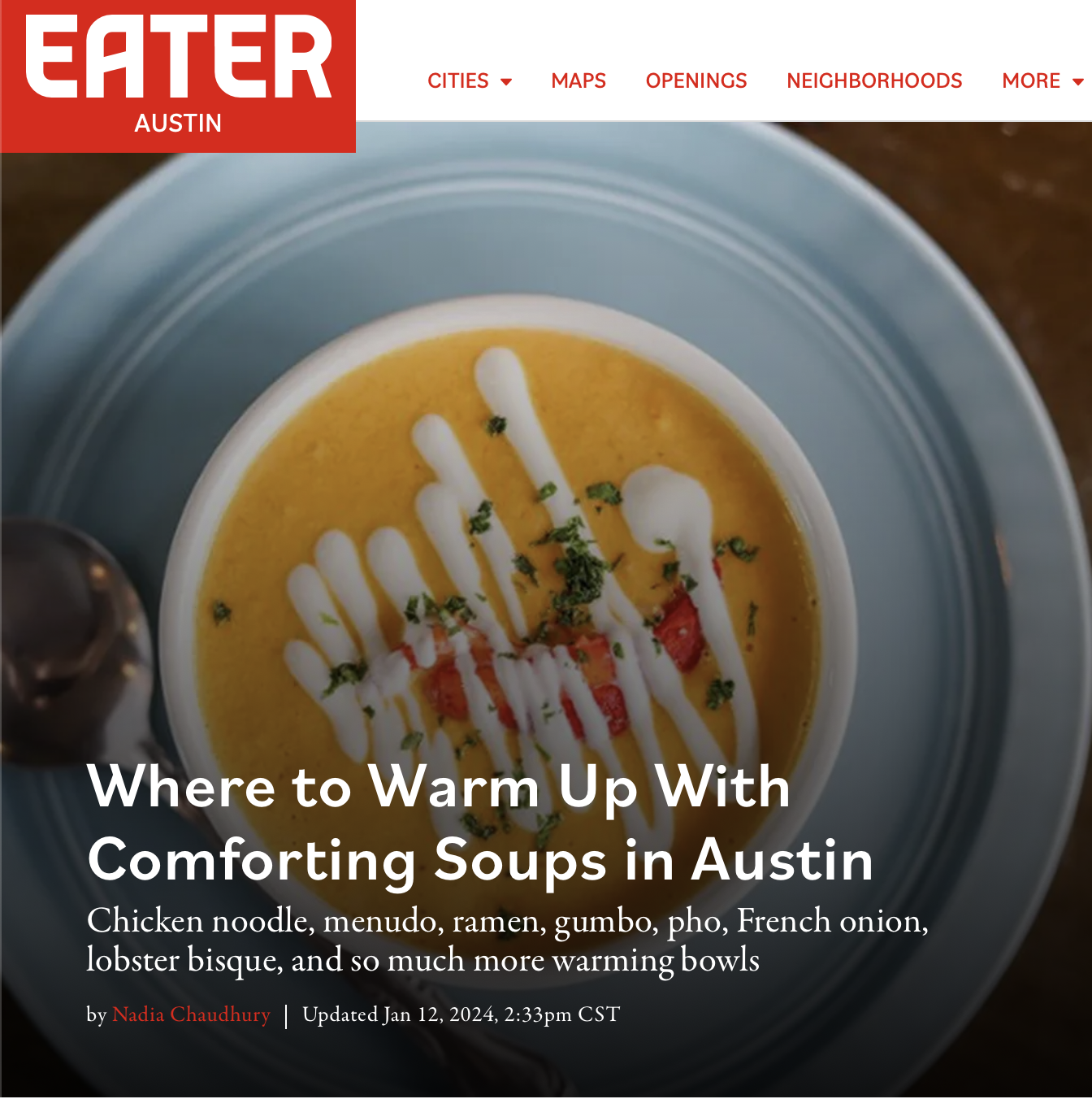 Article from Eater Austin featuring a soup in a bowl, covered with cream and garnished with herbs. Title: 'Where to Warm Up With Comforting Soups in Austin'. Subtitle mentions various soups.