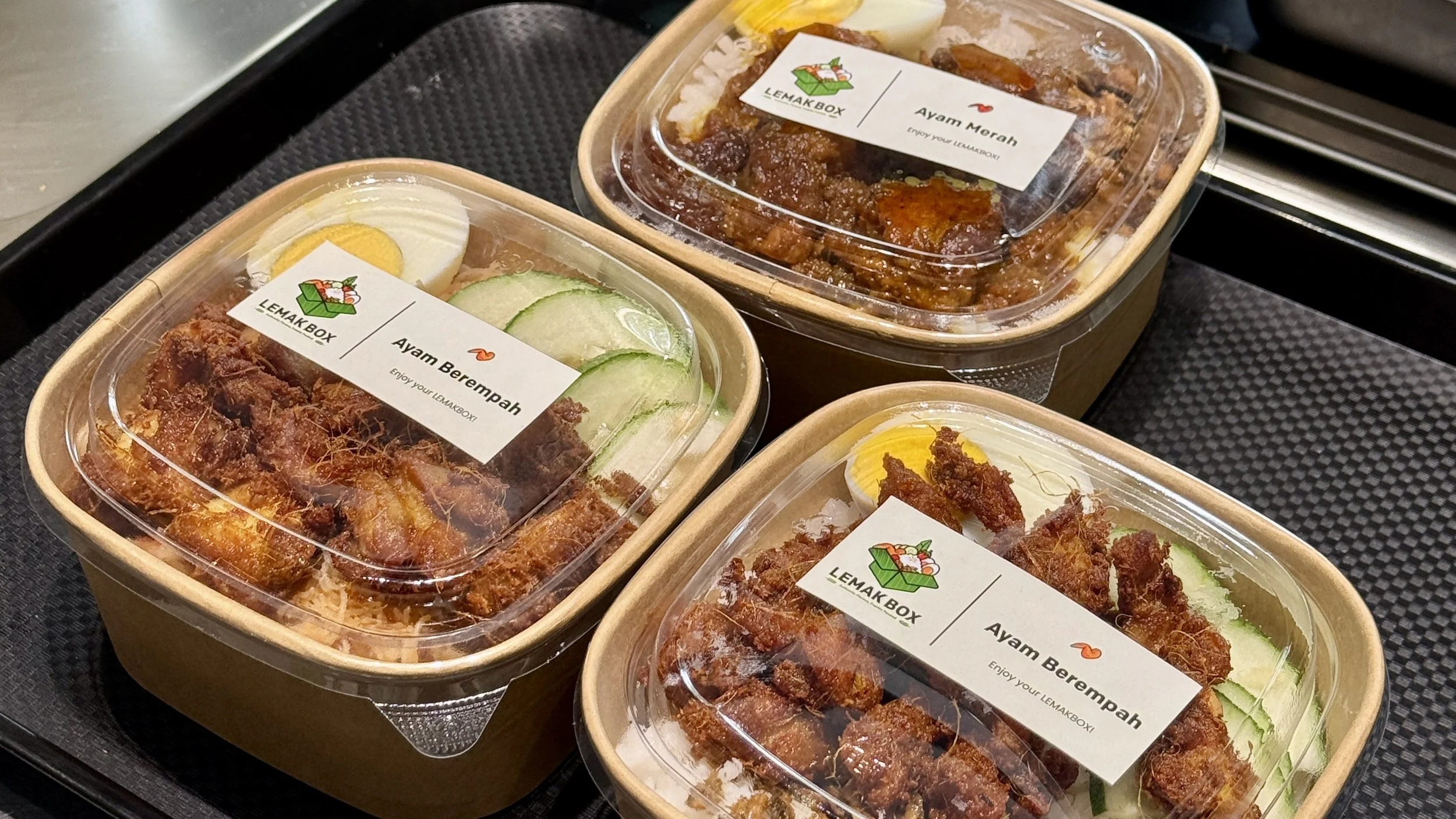 Packaged LemakBox Nasi Lemak Ayam Berempah sets ready for corporate catering and events in KL