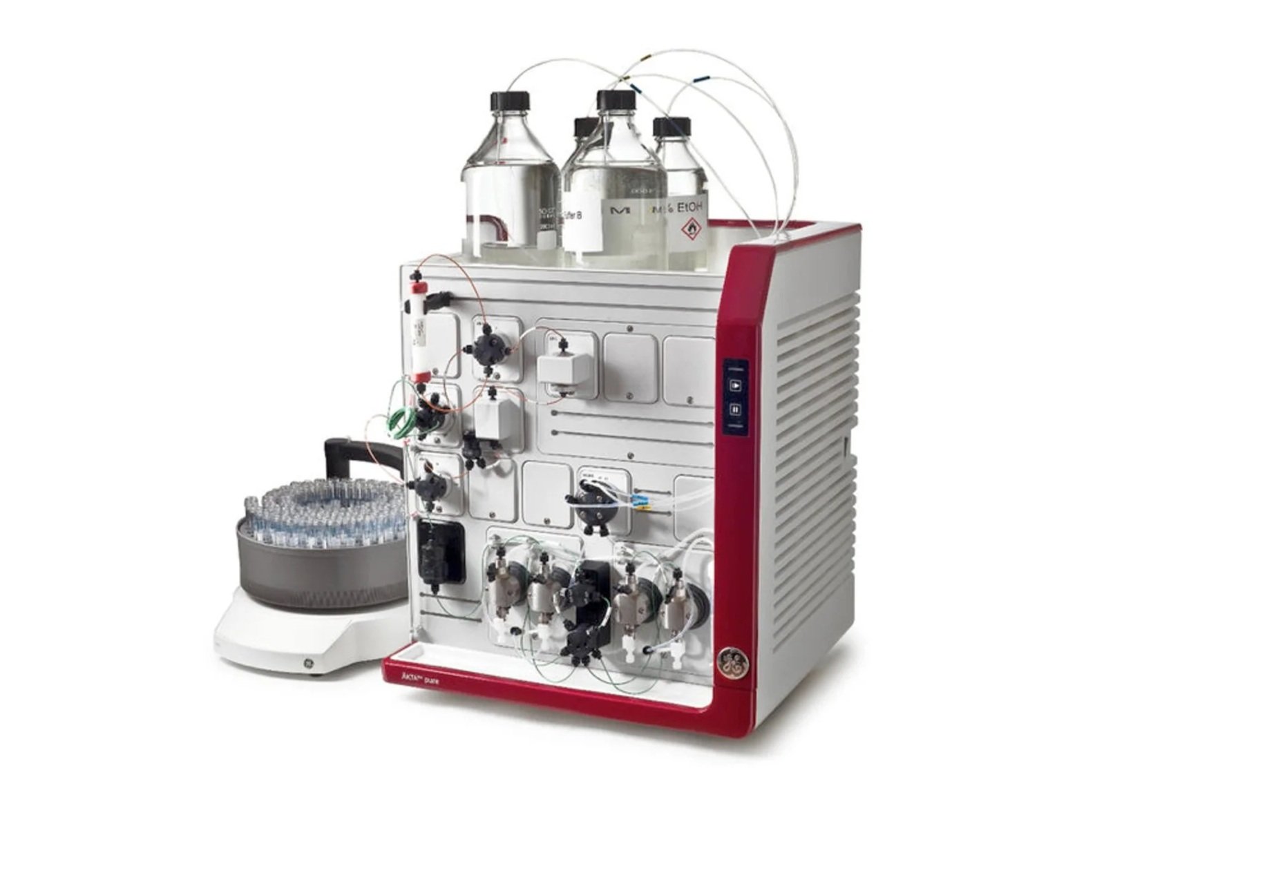 A laboratory chemical apparatus with bottles, tubing, and glassware, used for chemical analysis or synthesis.