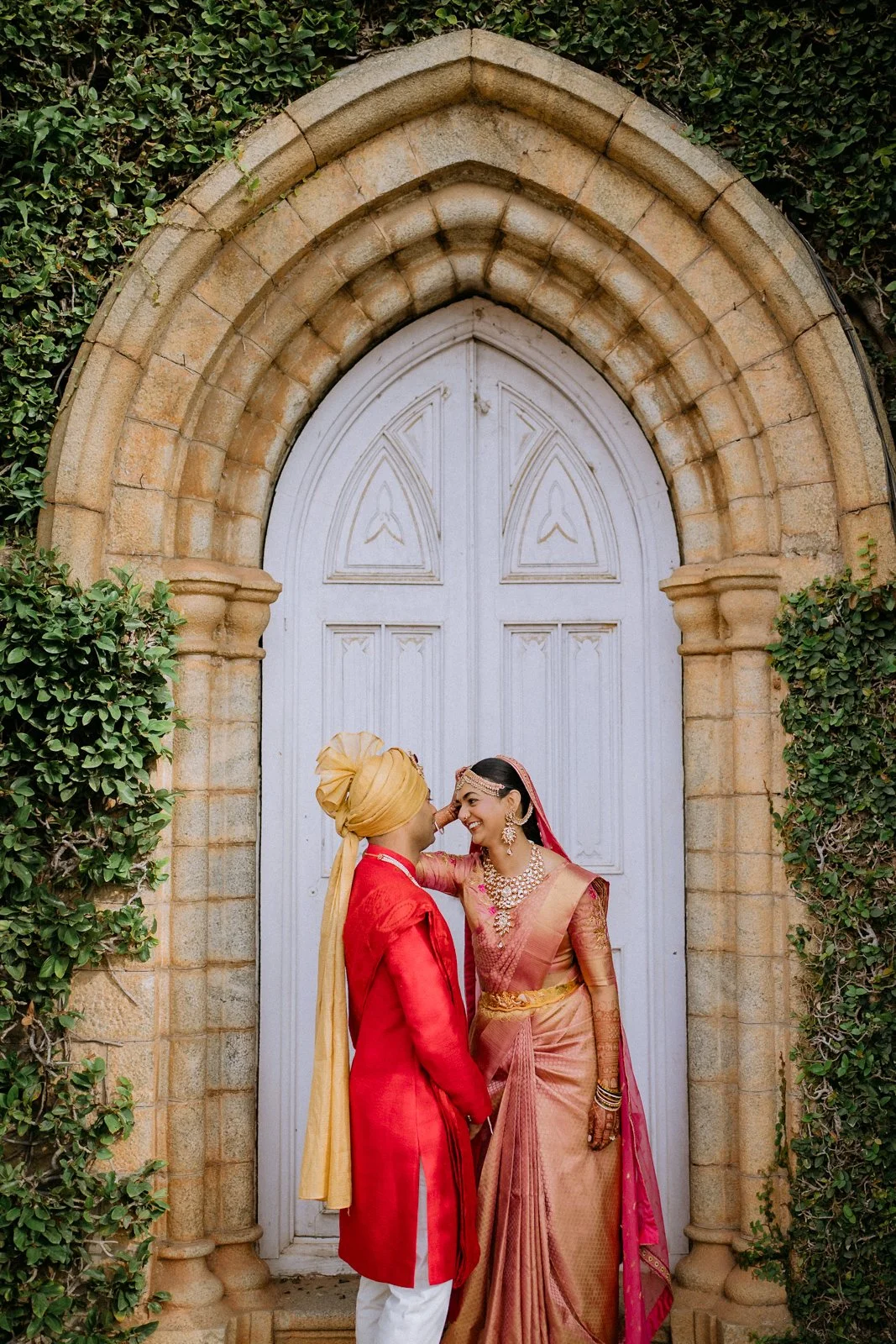 Akhil and Shrishti sharing a moment at a palace doorway