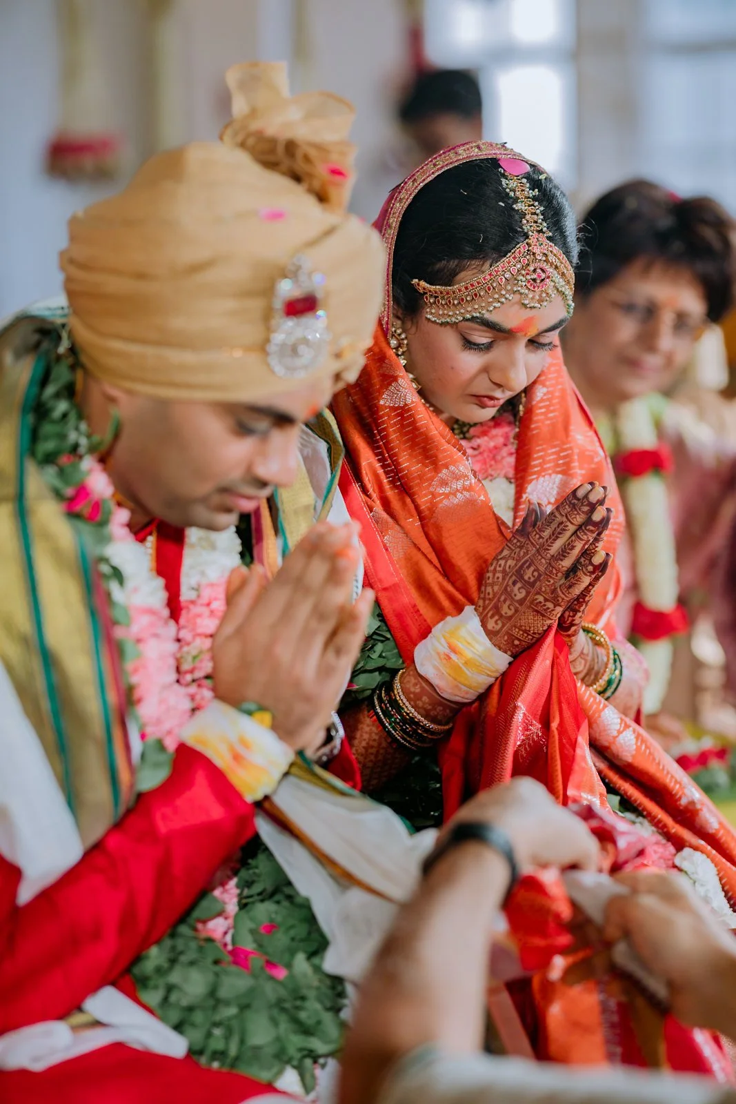 Bride and groom with folded hands during the muhurtham