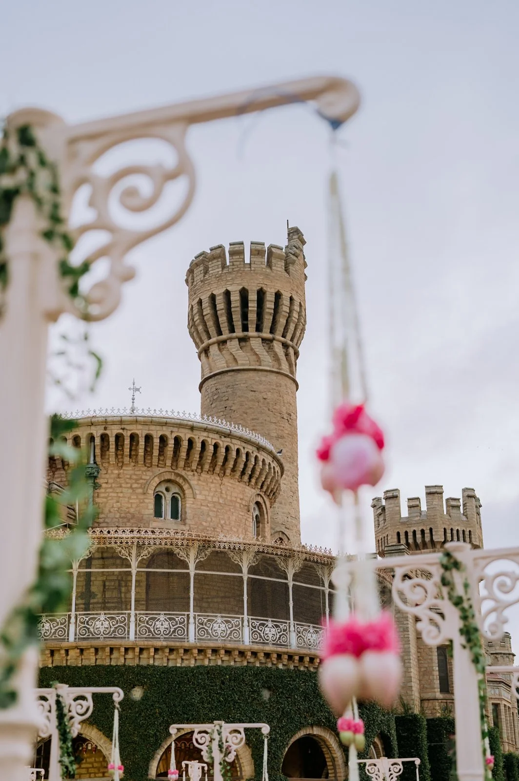 Bangalore Palace turret framed by pink lotus decor