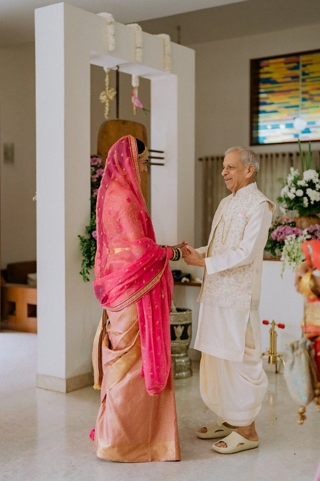 Shrishti greeting her grandfather before the wedding