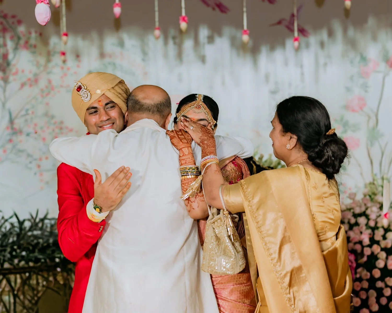 Akhil hugging family as Shrishti wipes a tear