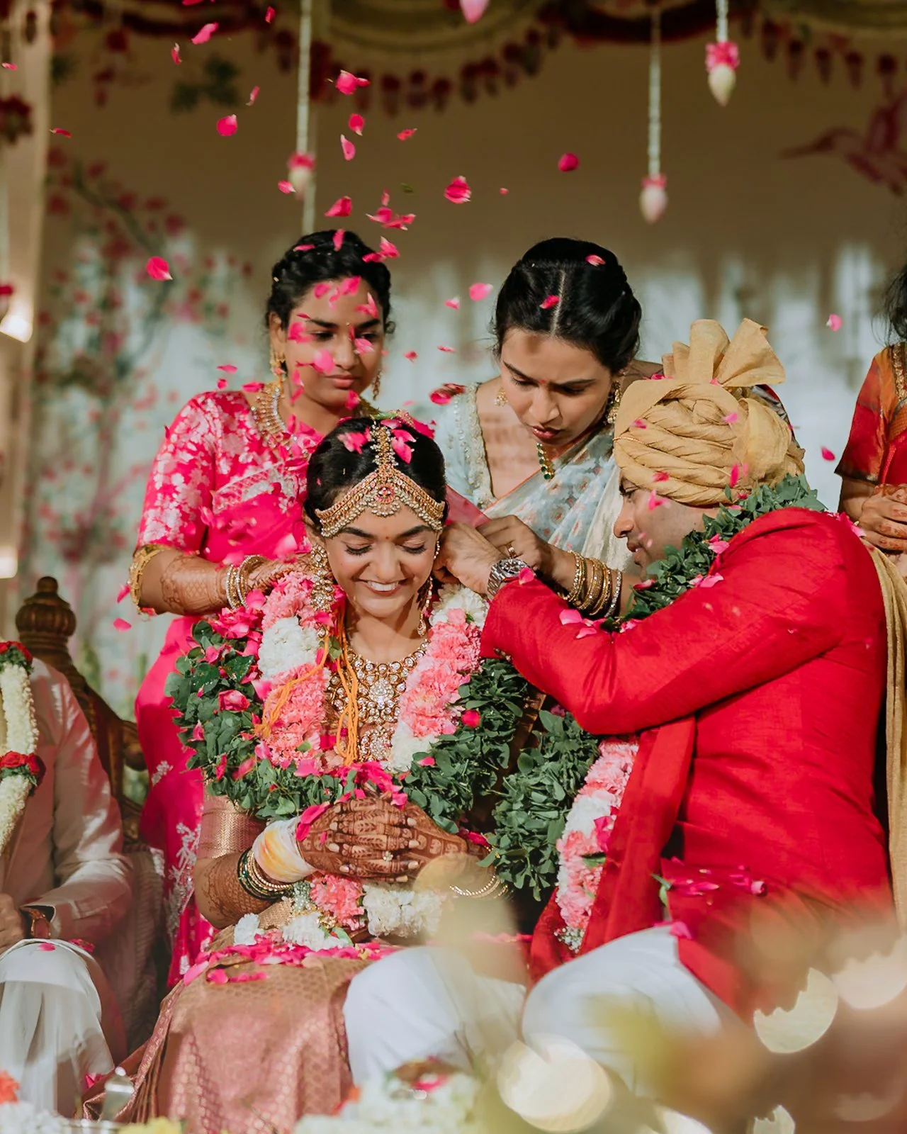 Petals falling as Akhil ties the mangalsutra