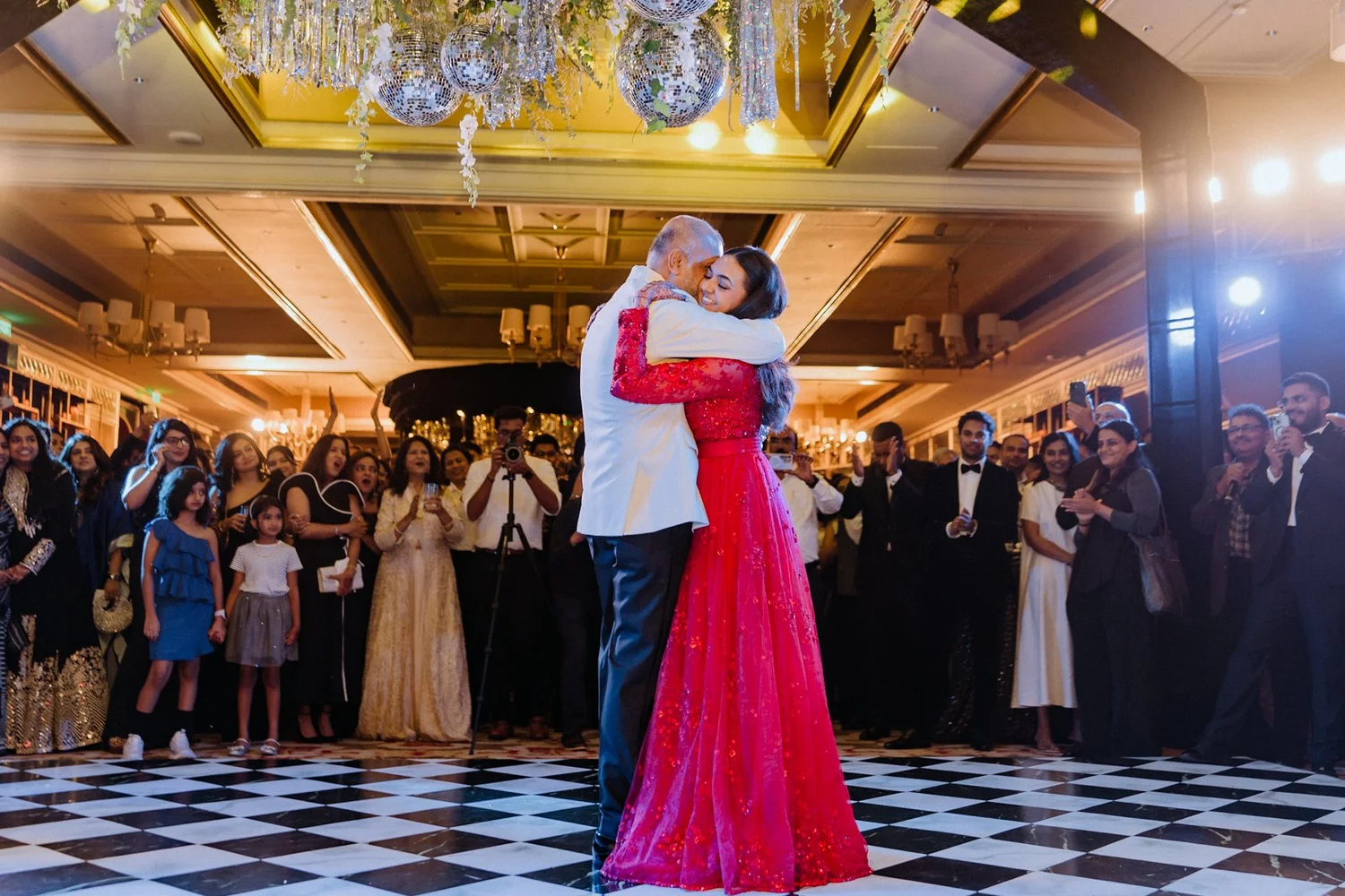 Shrishti hugging her father after their dance