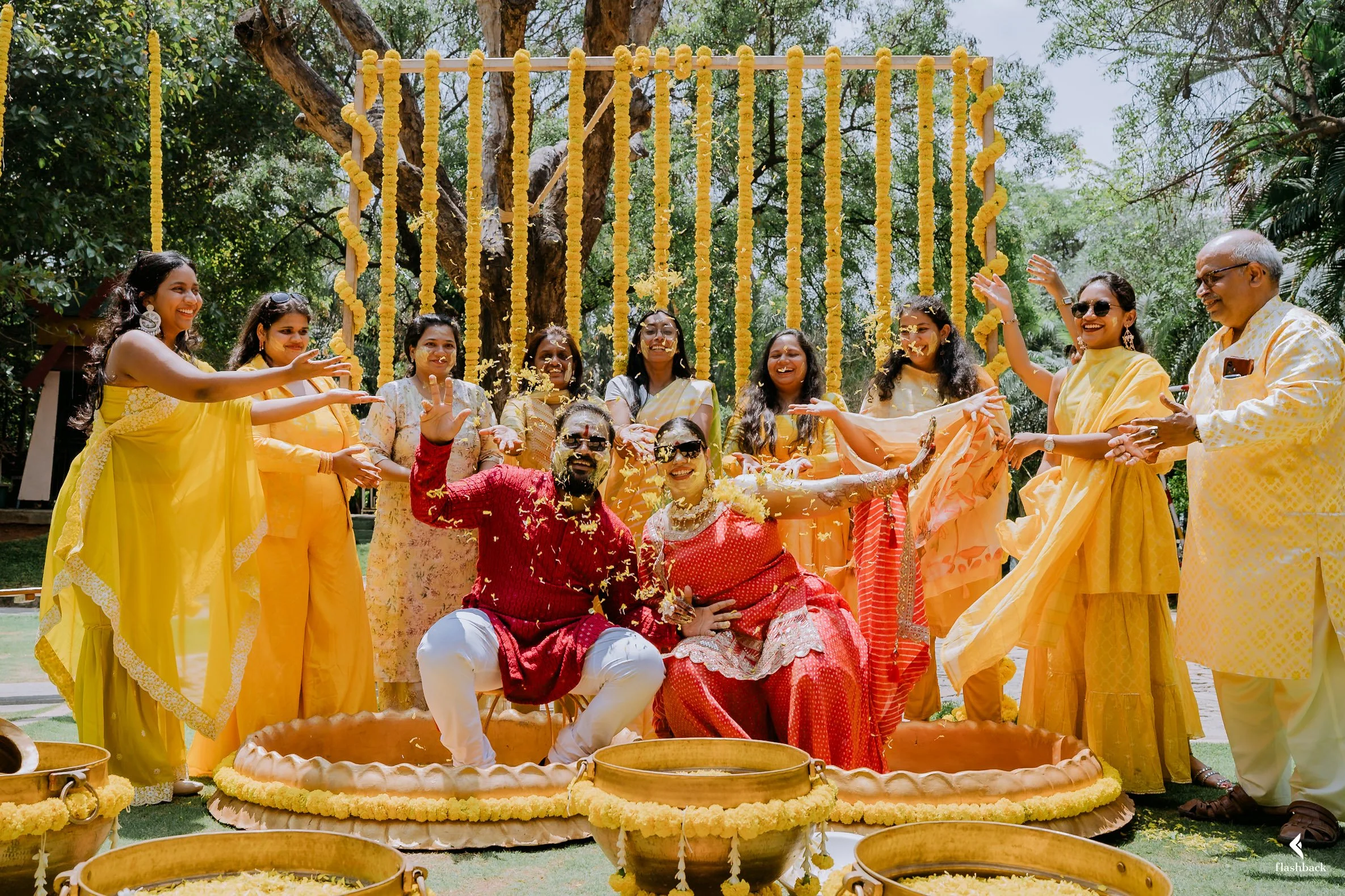 haldi-family-flowershower-haldi-indianwedding-couple-love-yellowhaldi-family-desi-kurta-haldidress.jpg