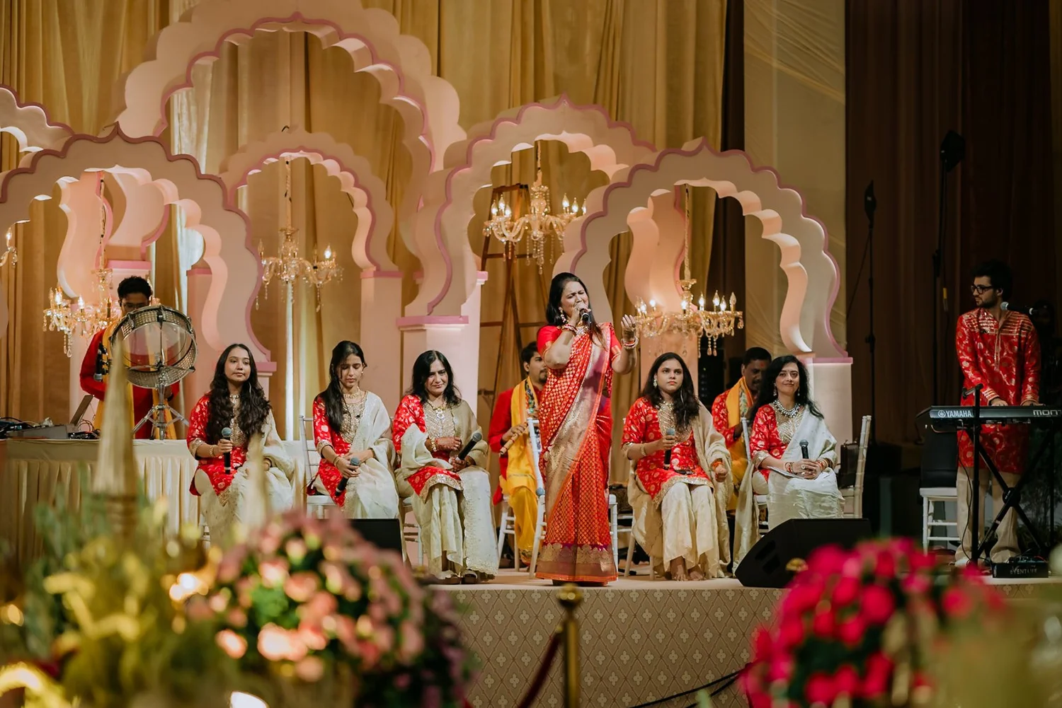 Singers performing on stage at the palace