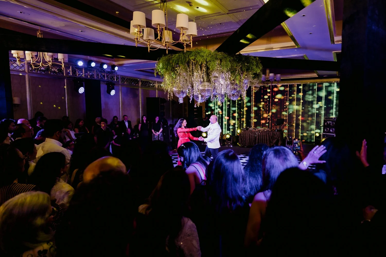 Guests cheering around the dance floor