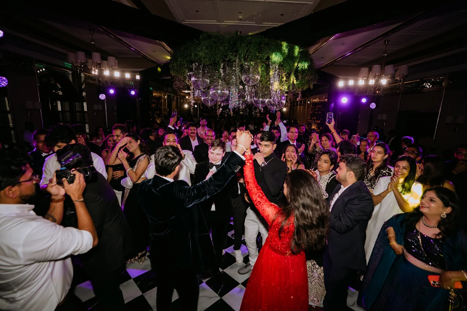 Shrishti dancing among guests on the dance floor