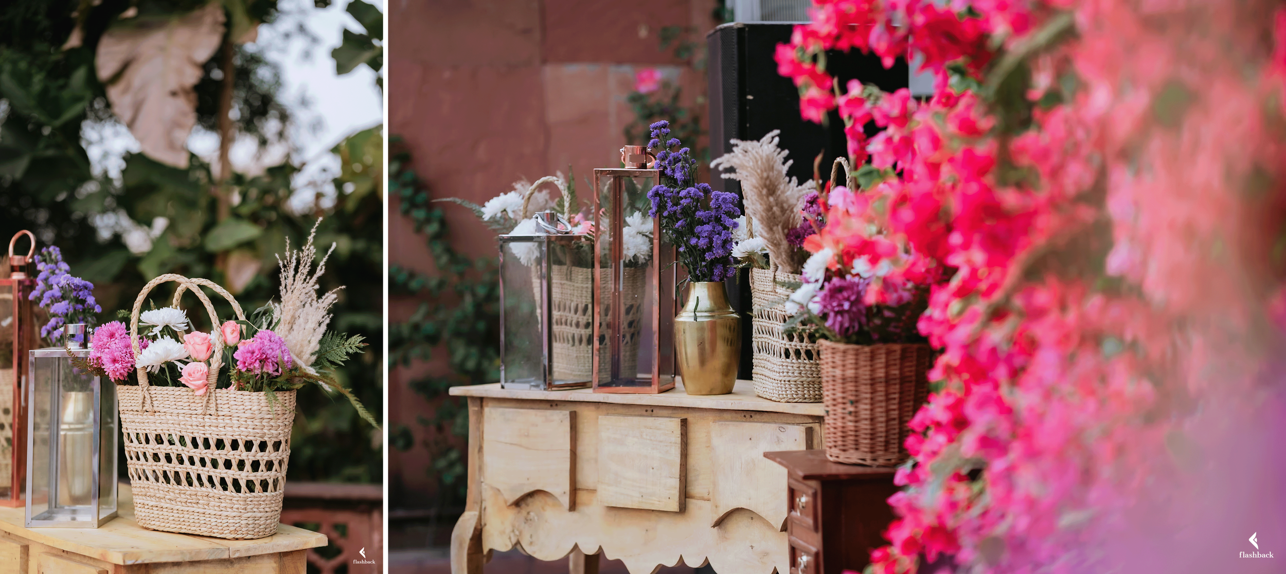 Display of colorful flower arrangements on a rustic wooden table, including pink roses, purple, white, and pink flowers in woven baskets and metallic vases, with lanterns, set against a garden backdrop.