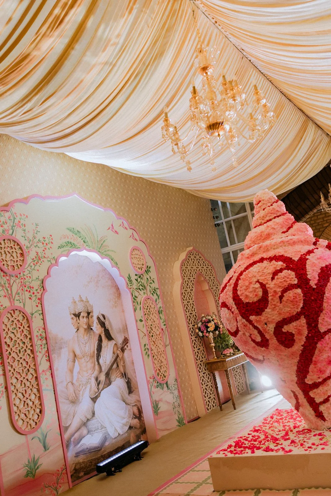 Painted Saraswati wall and draped ceiling inside the palace hall