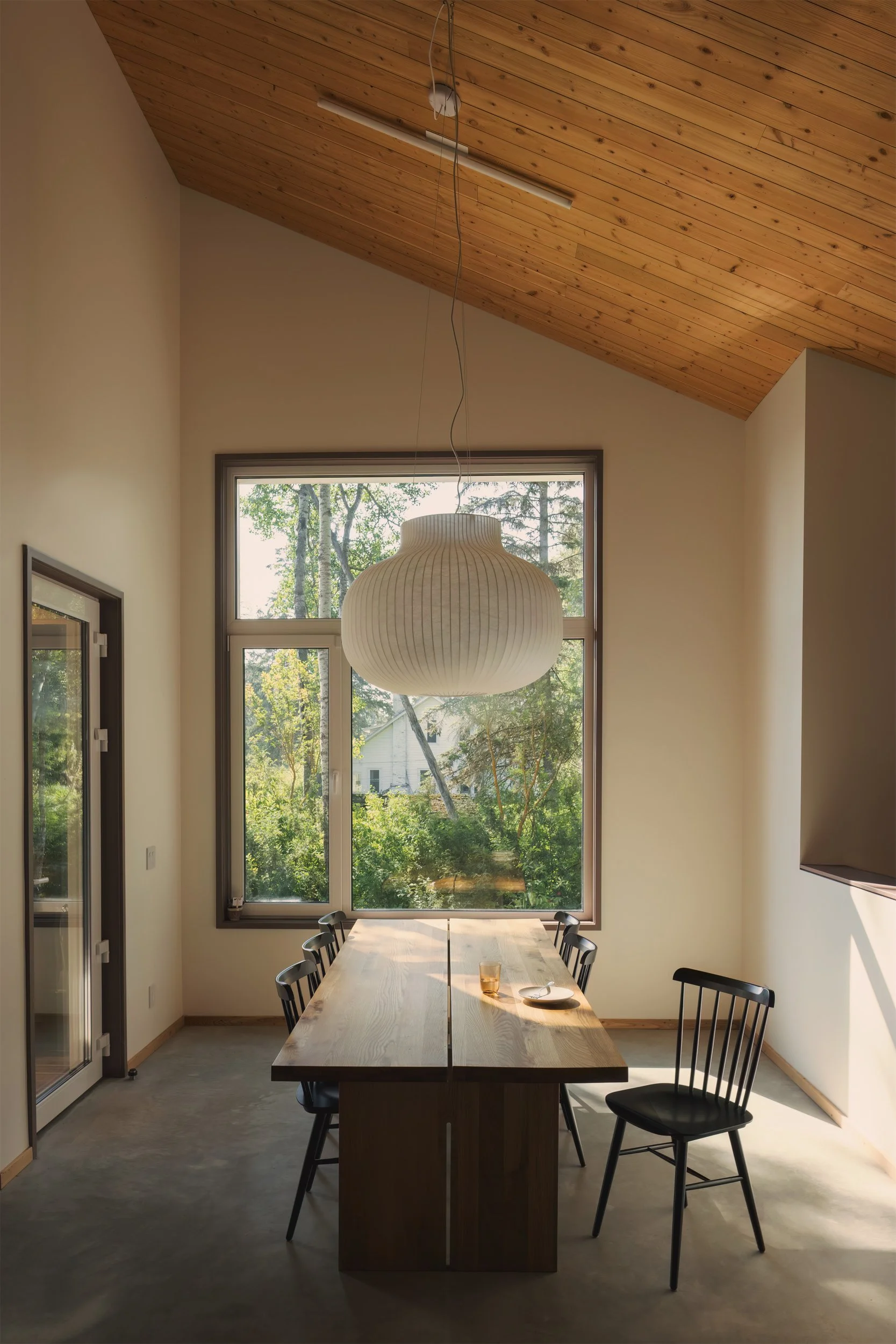 View out of dining room window of architectural cabin at Wabamun, Alberta near Edmonton