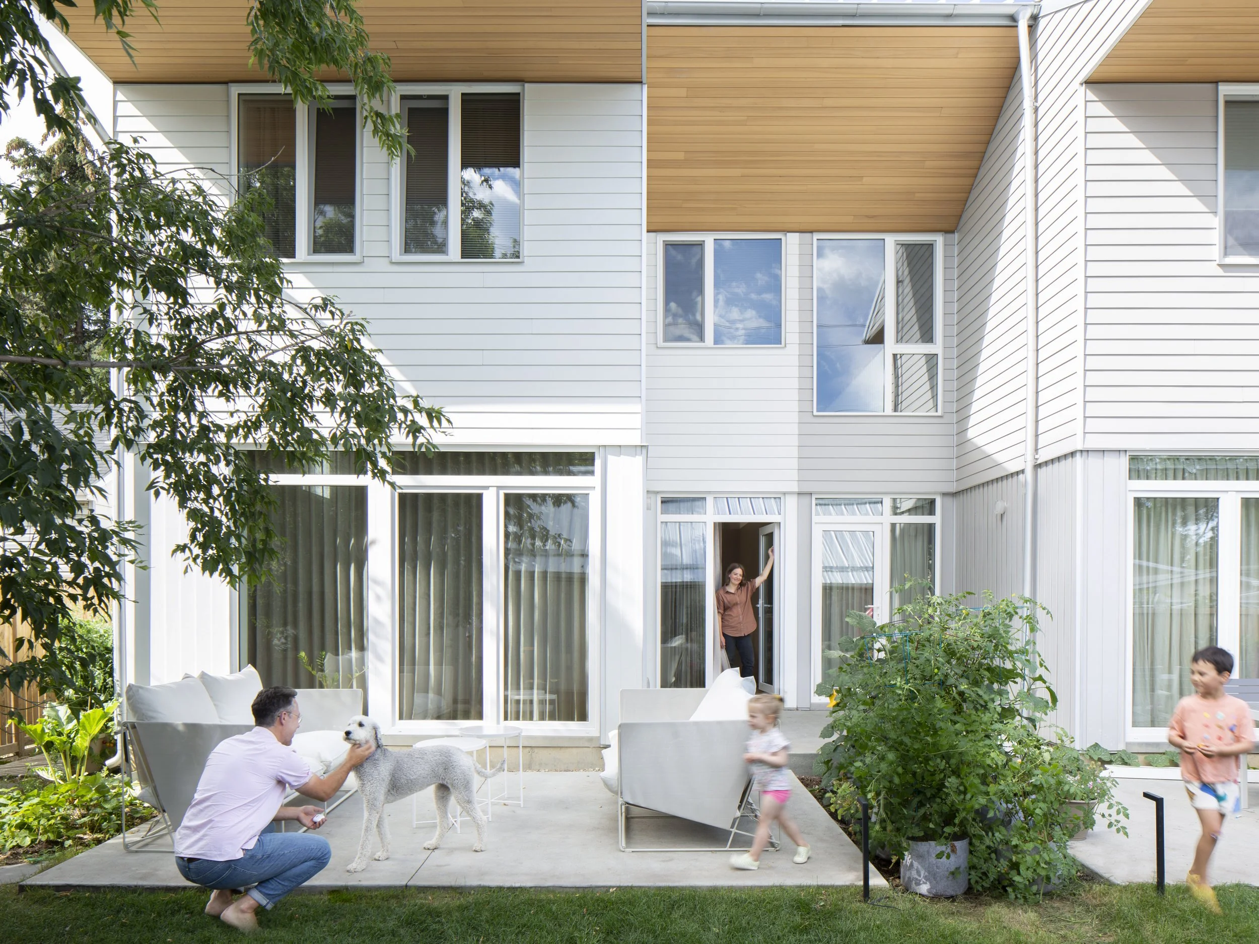 East facade of Bonnie Doon Duplex multi-family project in Bonnie Doon neighbourhood of Edmonton, Alberta.