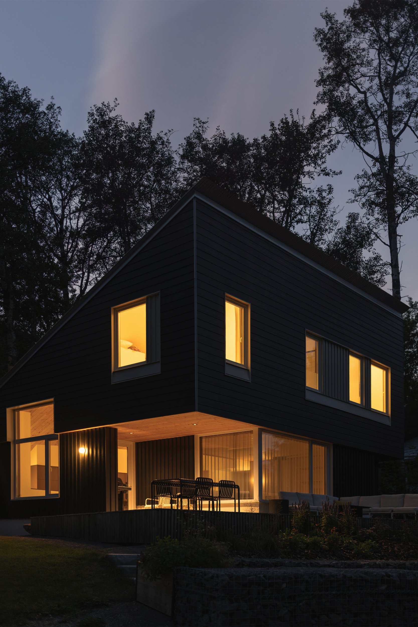 southeast night view of architectural cabin at Wabamun, Alberta near Edmonton