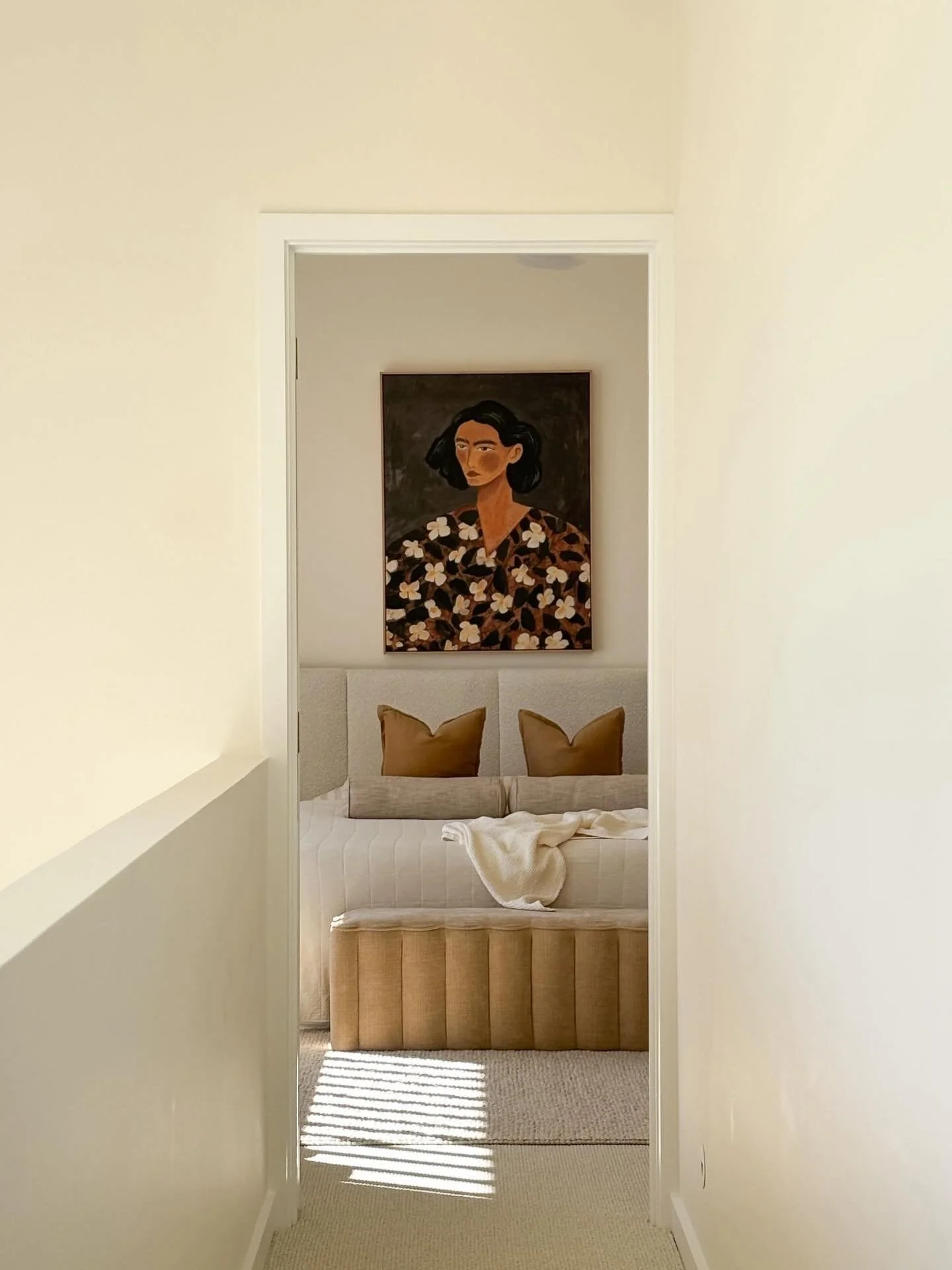 A little glimpse, a lot of calm 🤎

Soft layers, warm tones, and art that holds the room.