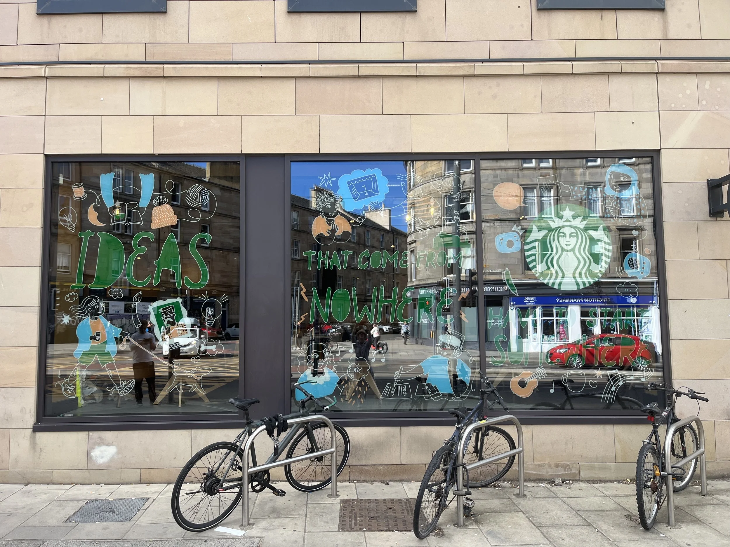 Window Illustration for Starbucks UK with We The Seeds art agency illustration including a person walking a dog and drinking coffee with a mother singing with her child a muslim woman painting and a boy writing a song wearing headphones cans knitting