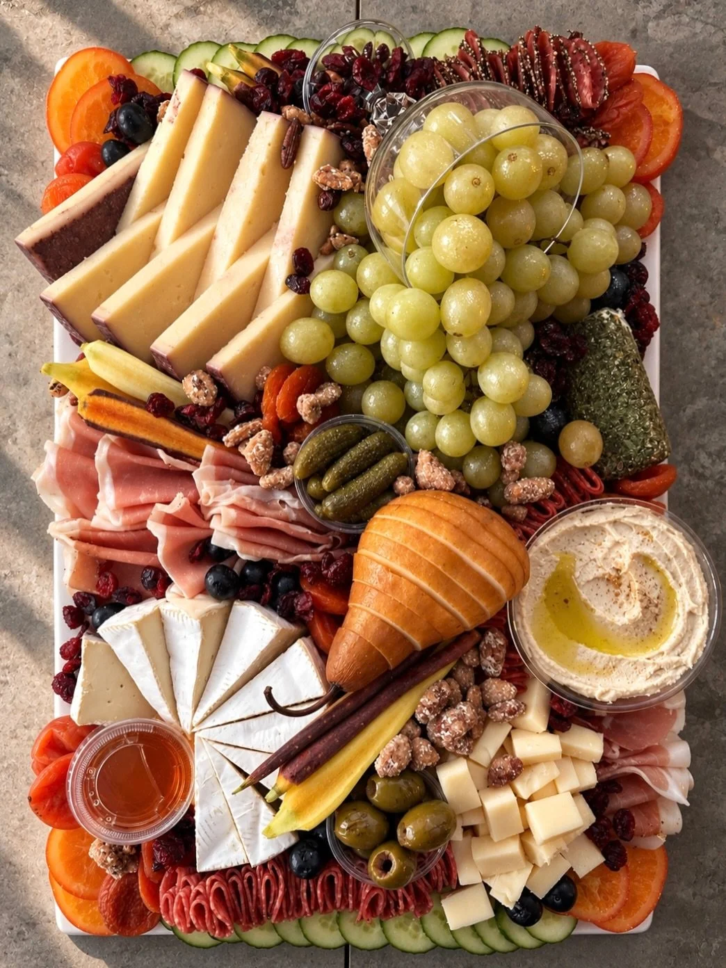 The first board of the holiday season!

The party theme was Taylor Swift&rsquo;s &ldquo;champagne problems&rdquo; so naturally I had to work in a coupe glass of green grapes spilling out and dusted with edible gold glitter!

#charcuterie #charcuterie