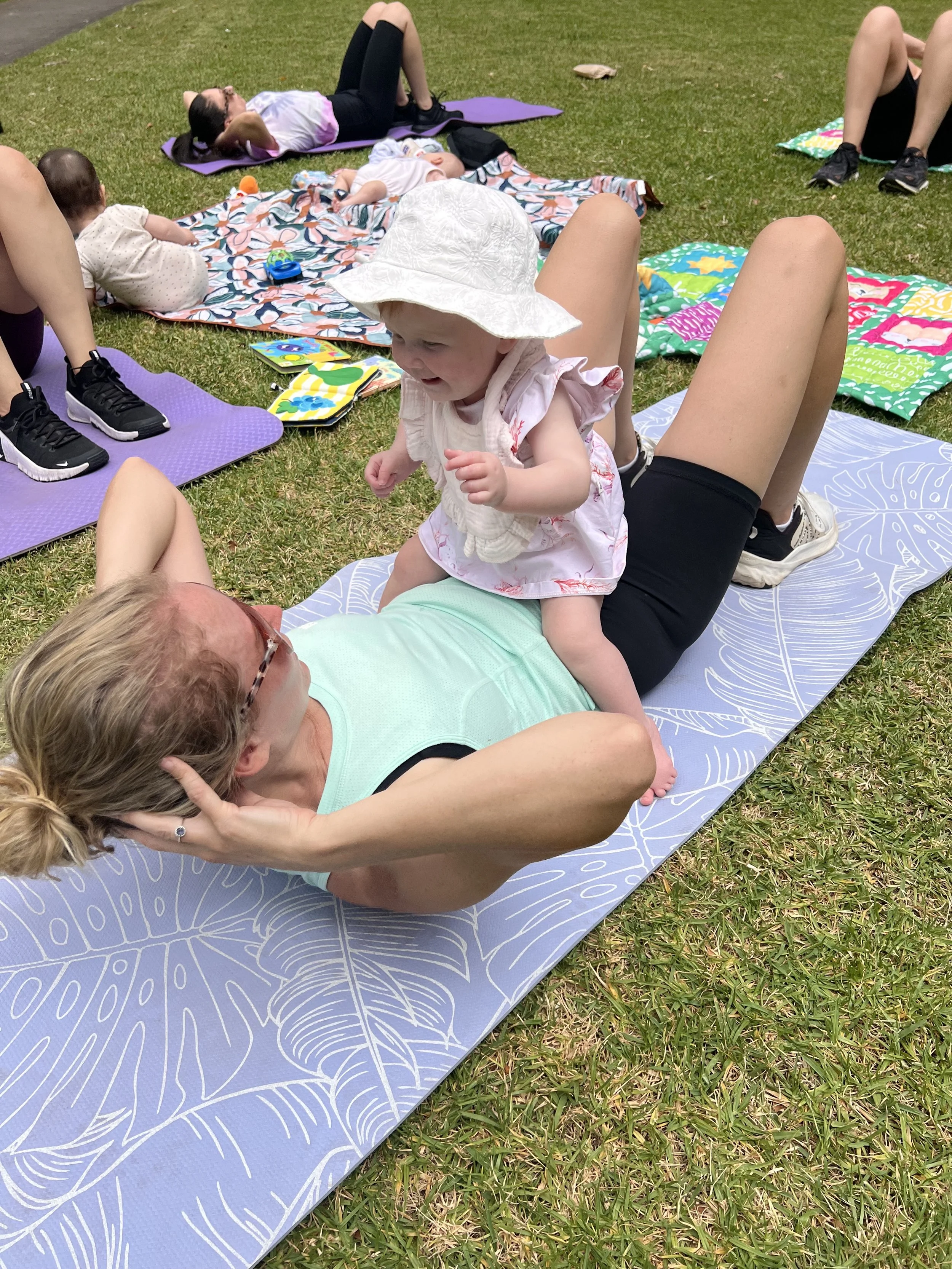Image of a mother and child doing crunches