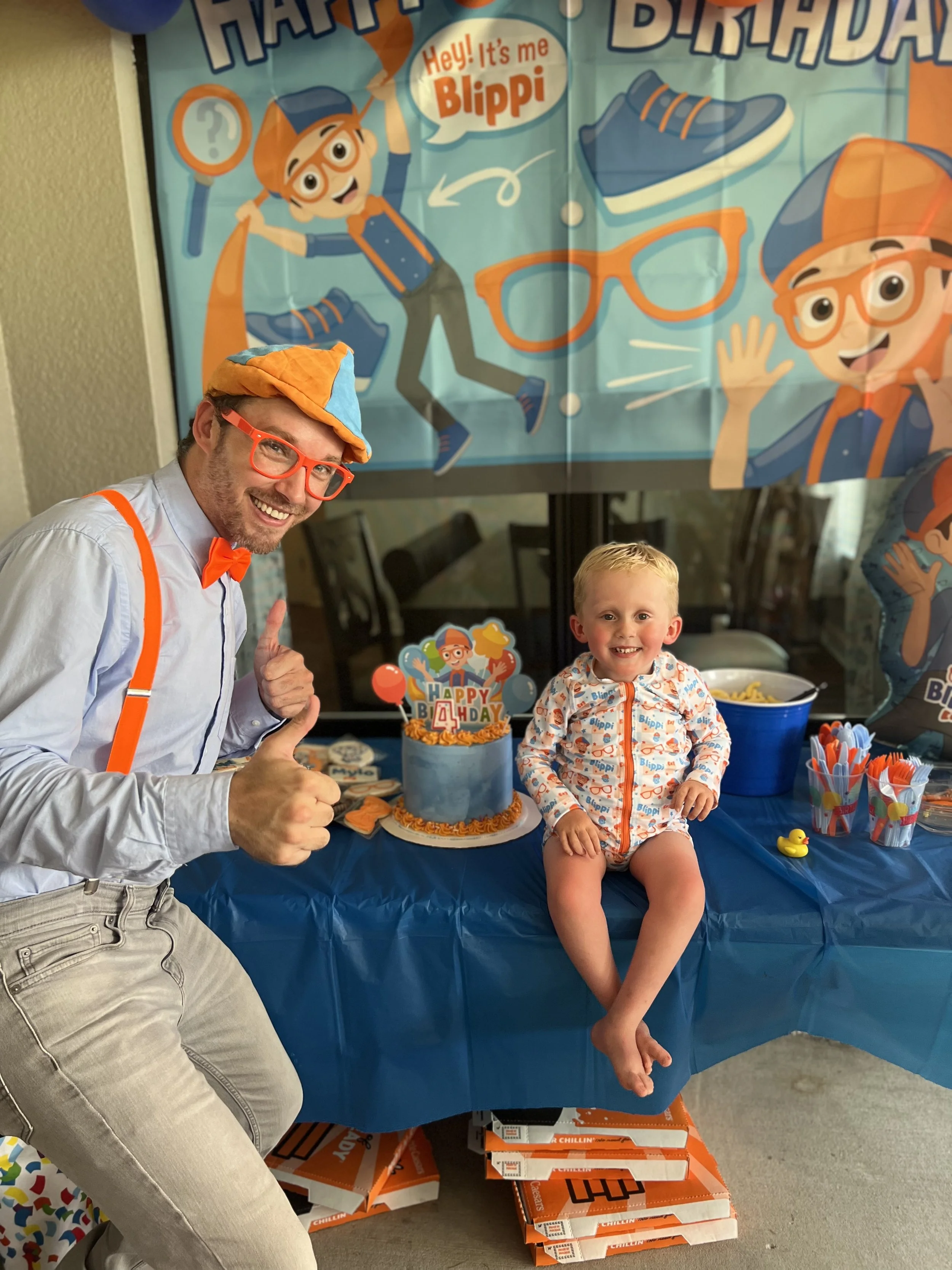 Blippi-inspired Adventure Guy entertaining children at a fun kids birthday party