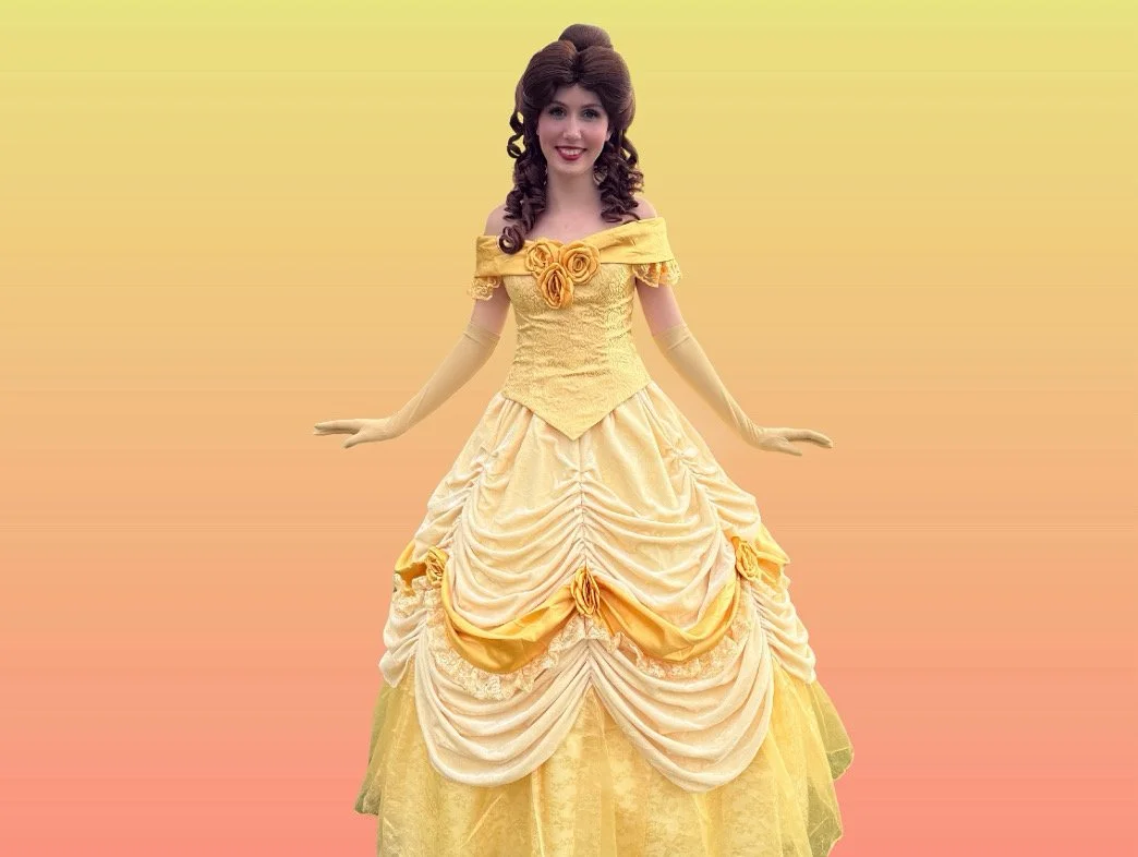 A woman dressed as Belle from Disney's Beauty and the Beast, wearing a yellow ball gown with off-shoulder design, on a gradient background. Princess Party Characters Orlando